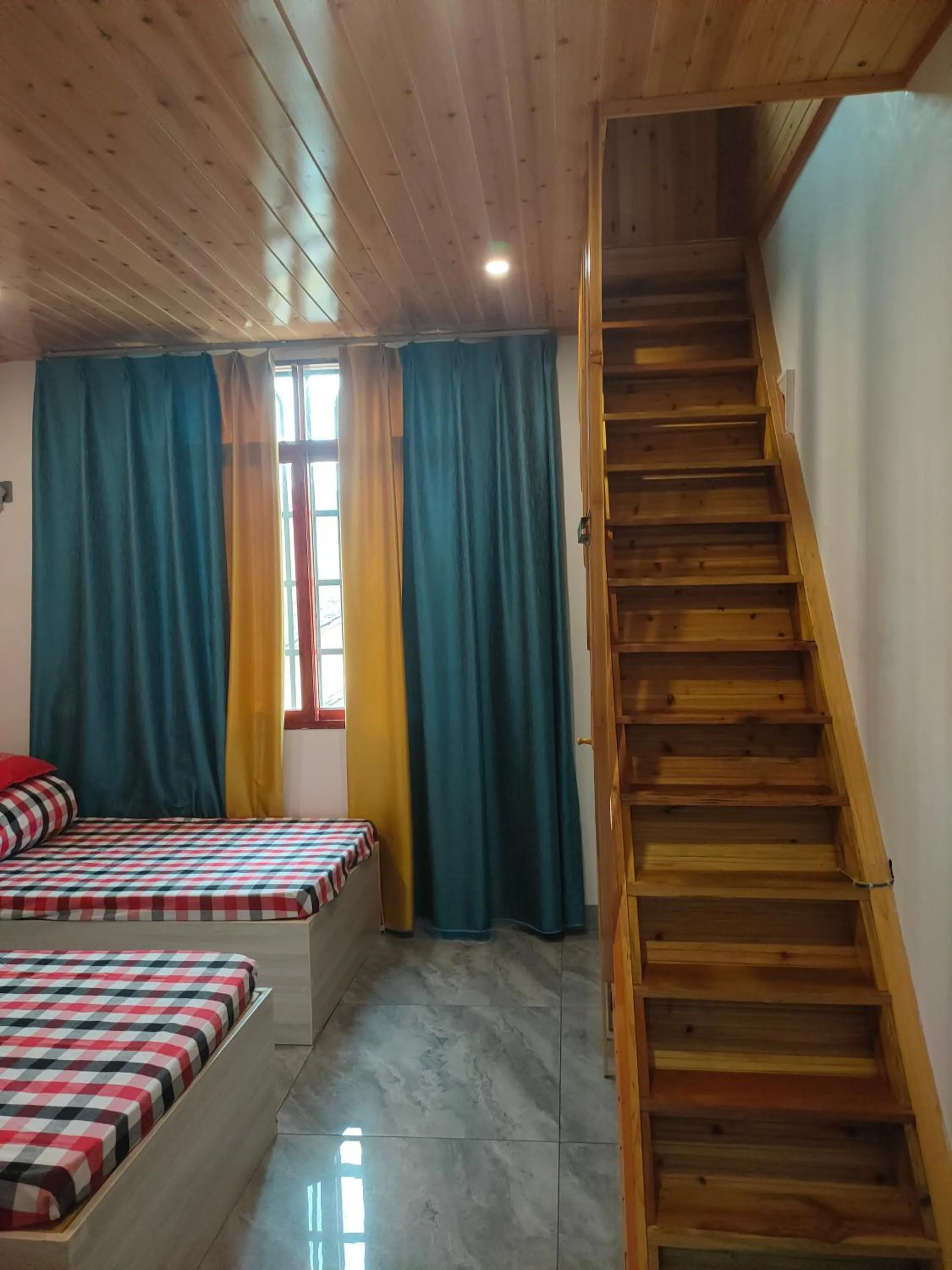 Bed in Nanjing Tulou Qingdelou Inn