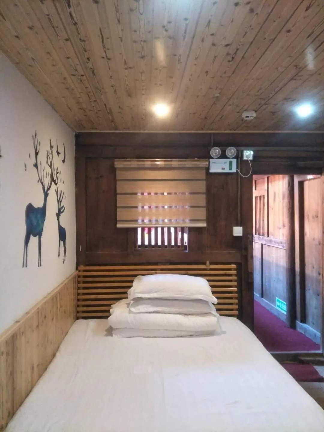 Bed in Nanjing Tulou Qingdelou Inn