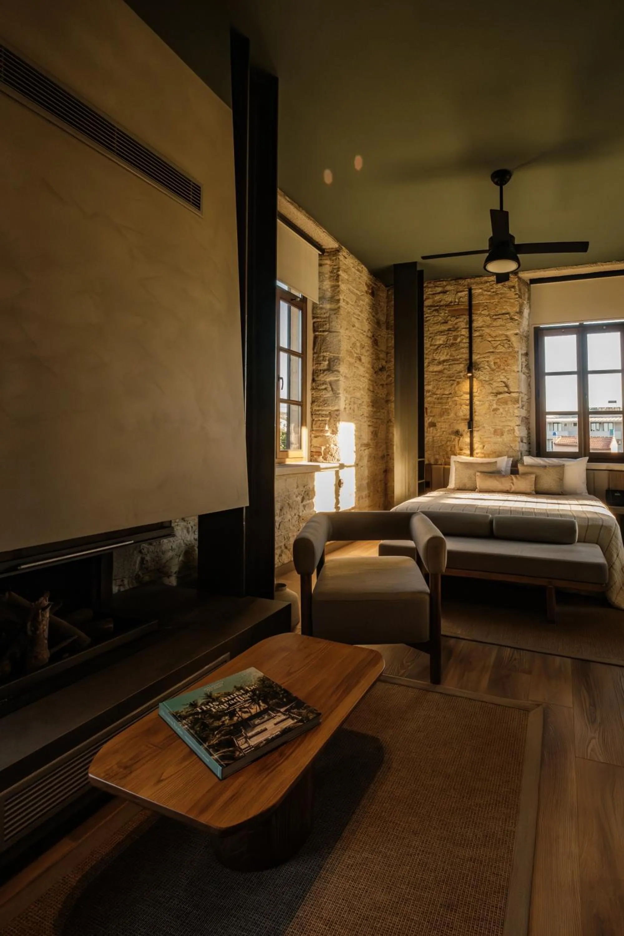 fireplace, Bed in Lecole Hotel By Cityloft