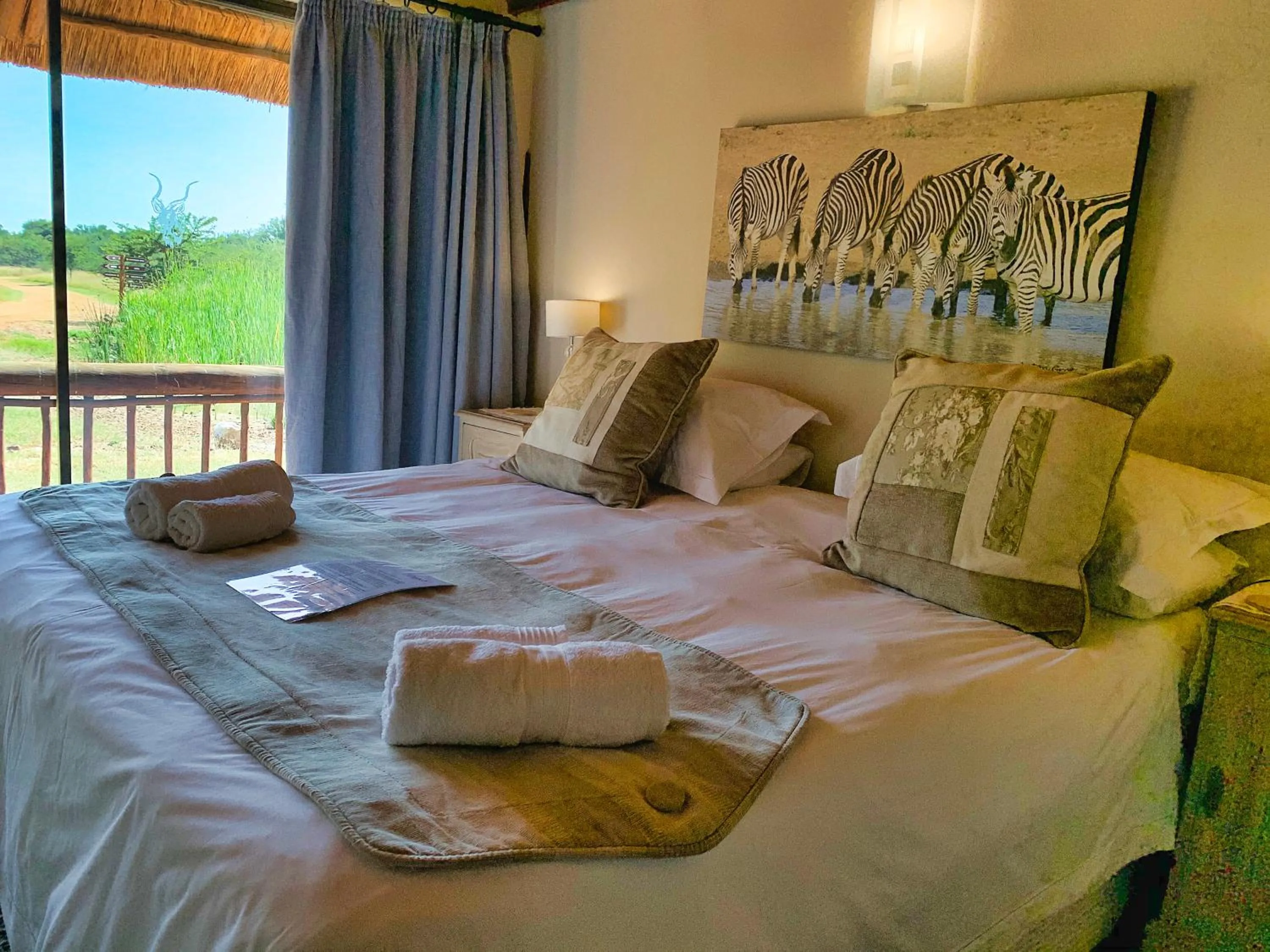 View (from property/room), Bed in Tshikwalo Game Lodge