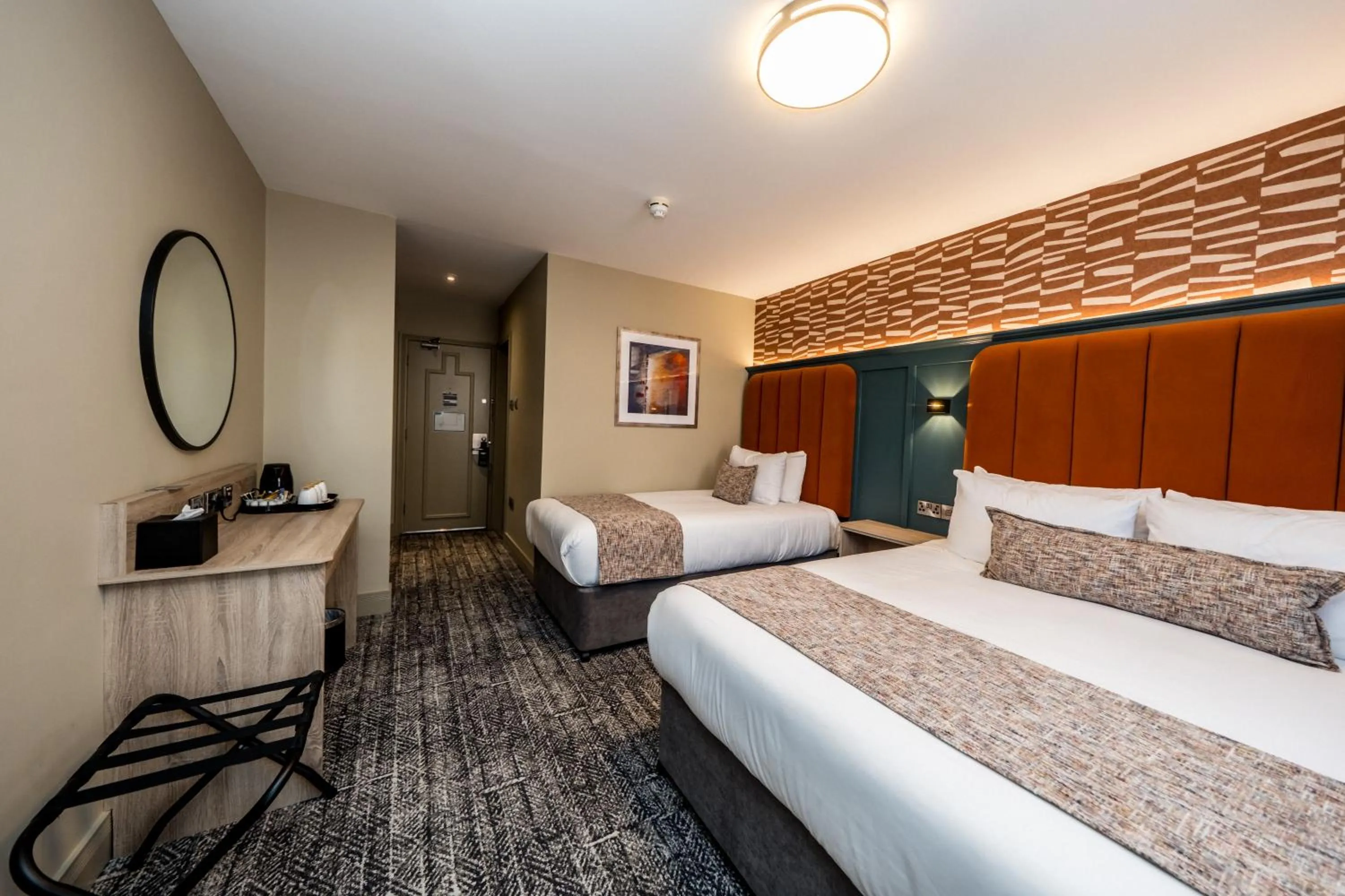 Bed in The Maiden City Hotel