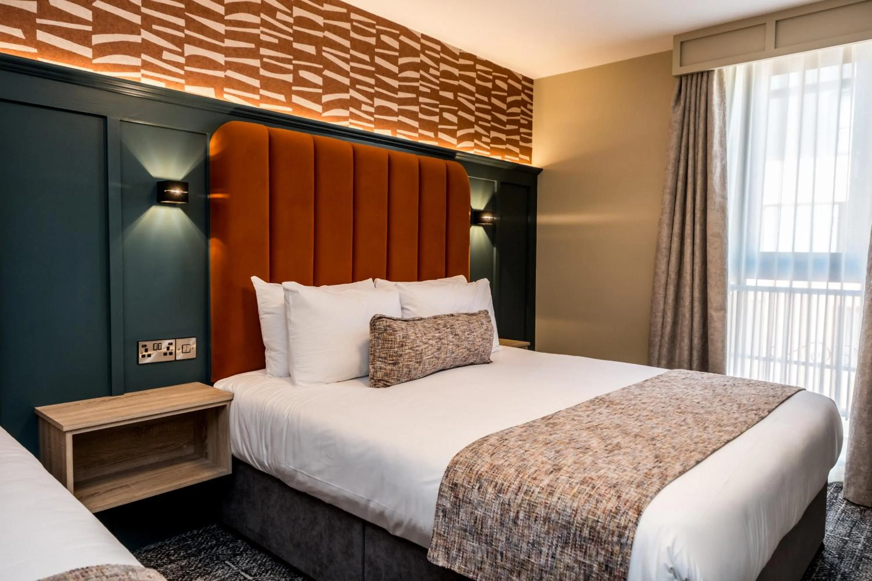 Bed in The Maiden City Hotel