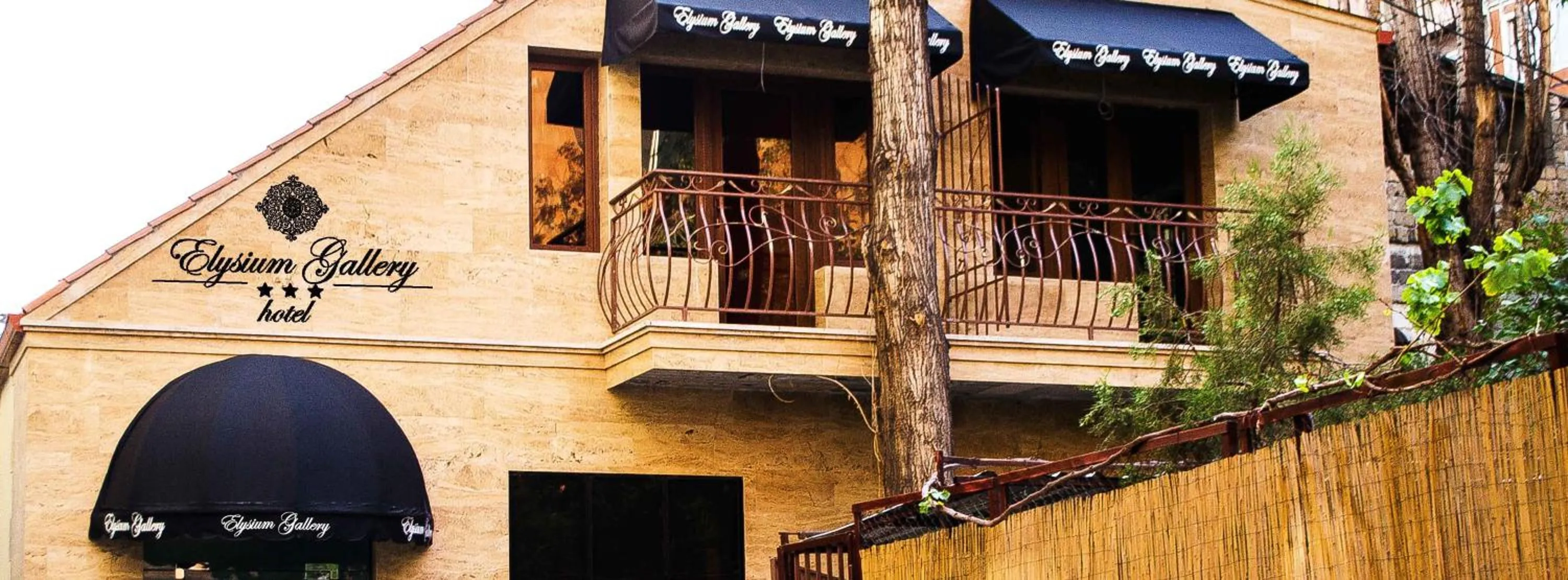 Property building in Elysium Gallery Hotel