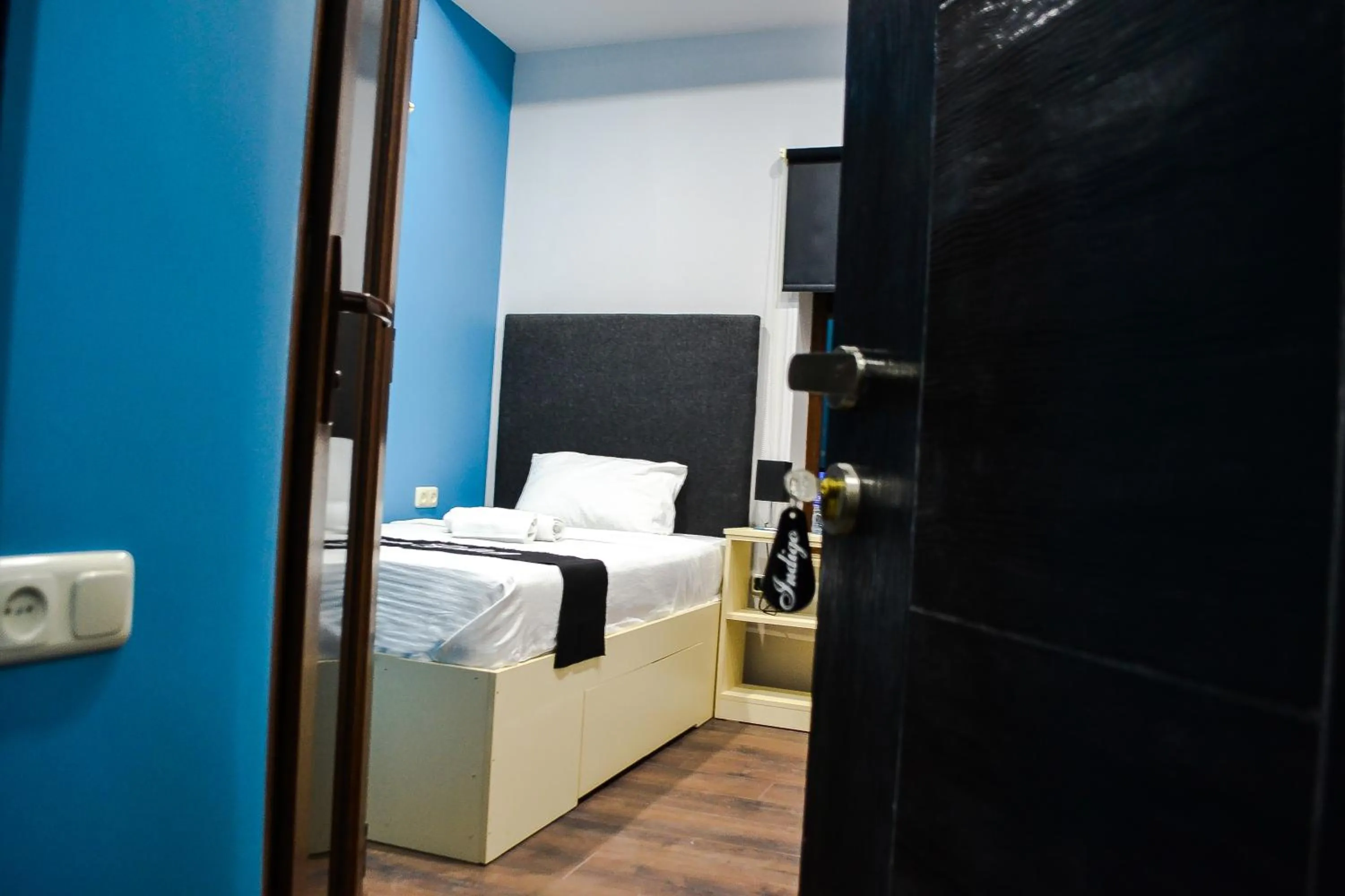 Bed in Elysium Gallery Hotel