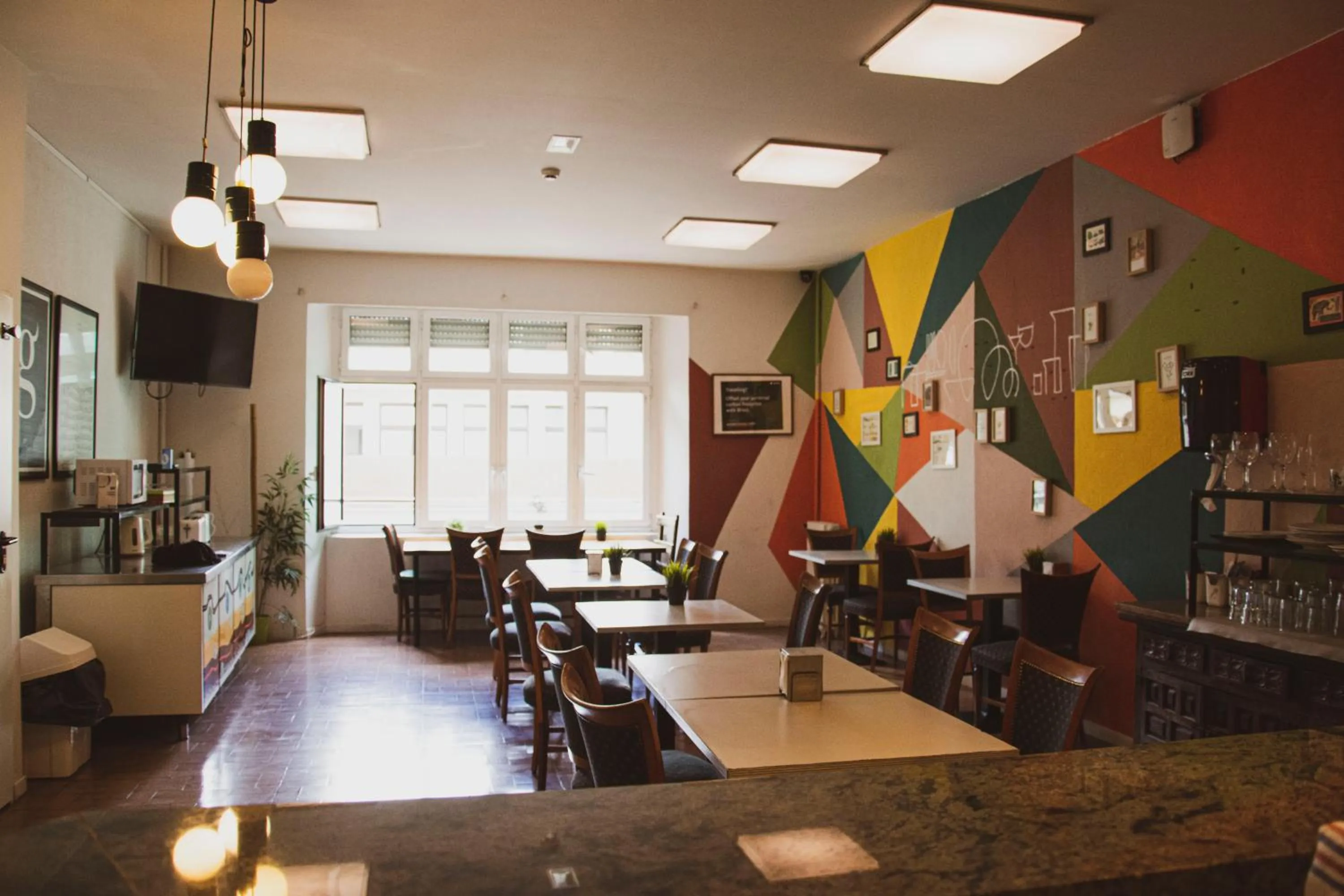 Communal kitchen in A Room In The City Hostel