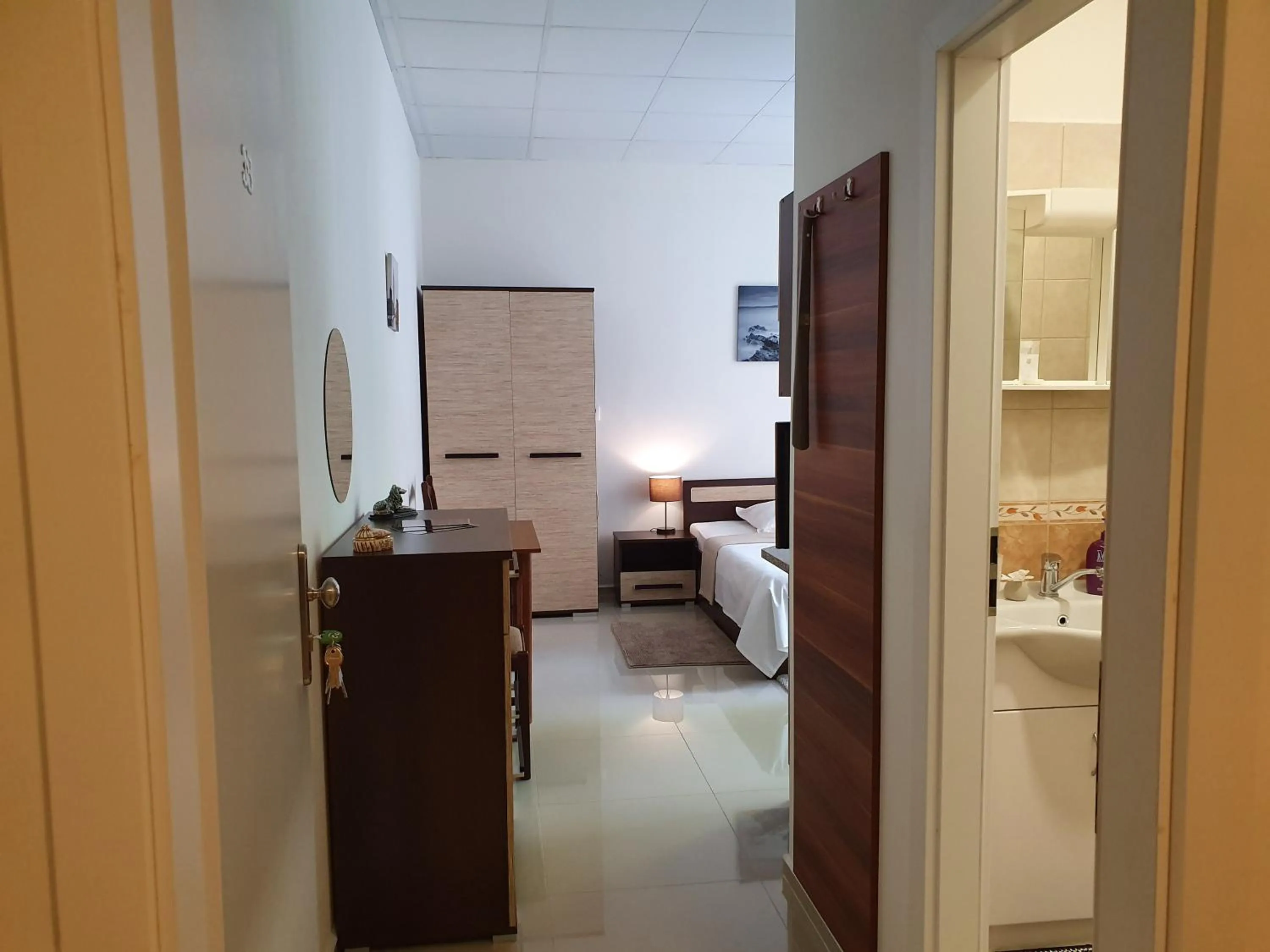 Dining area, Bed in Madonna Apartments