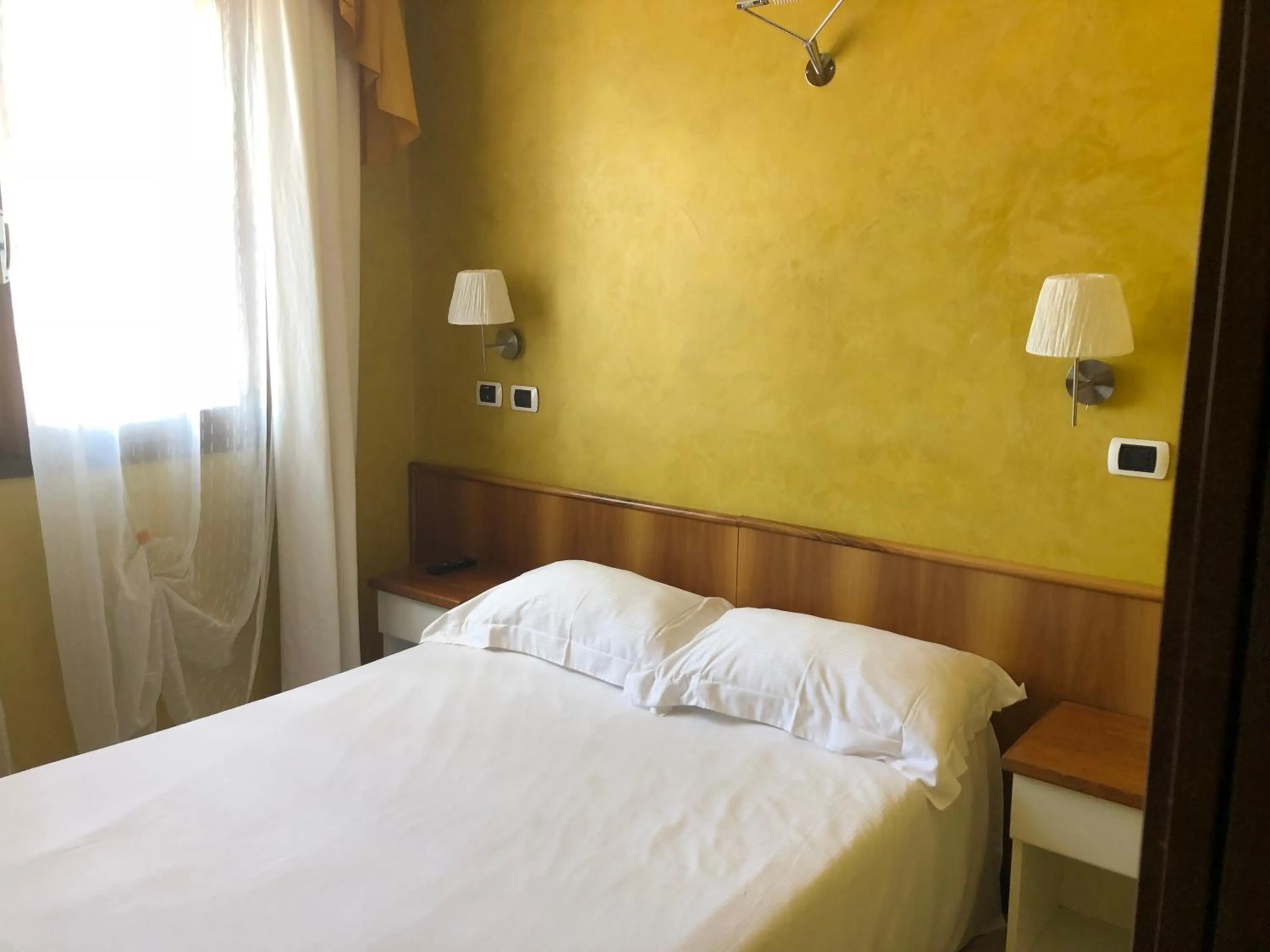 Bed in Hotel Malpensafiera