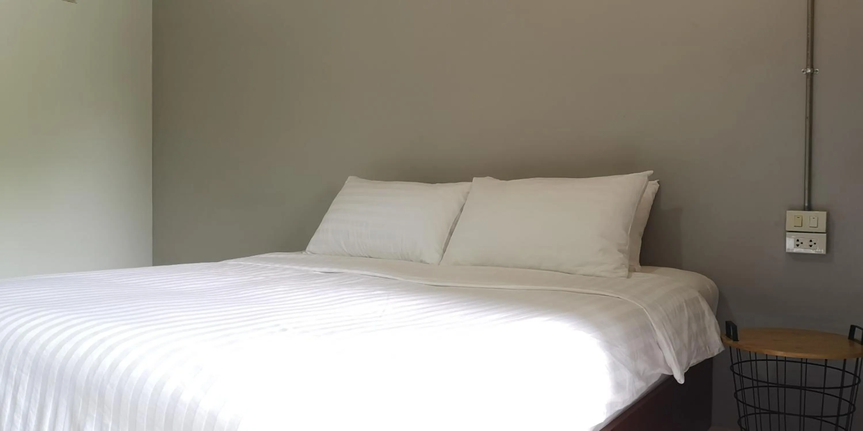 Bed in Siri Guesthouse @ Surat Thani