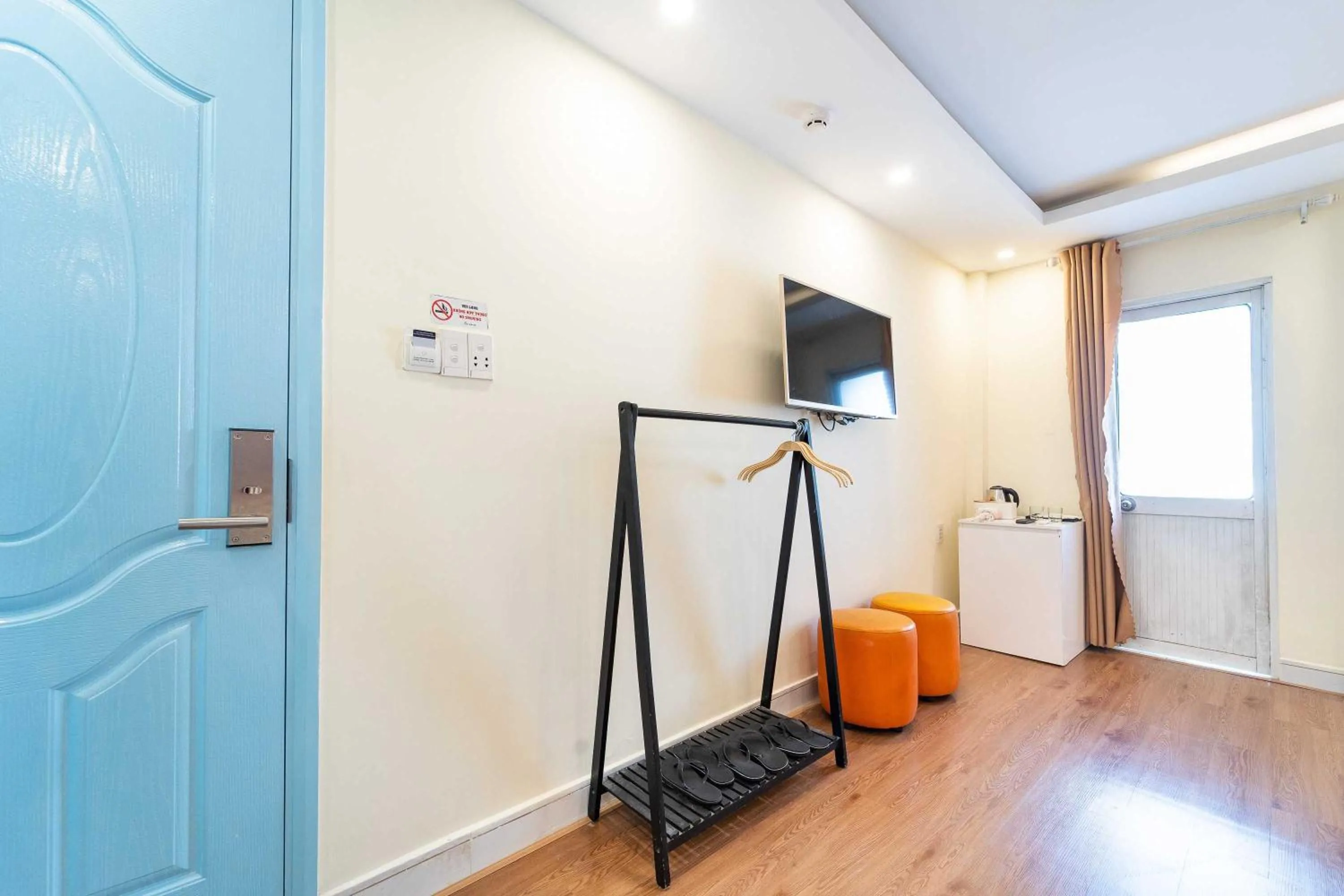 TV and multimedia in Joy Inn Hotel - Near T3 Terminal