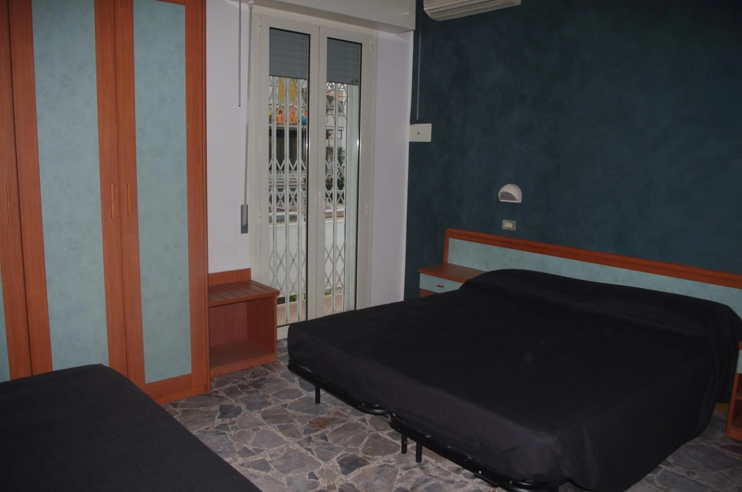 Bedroom in Hotel Costanza