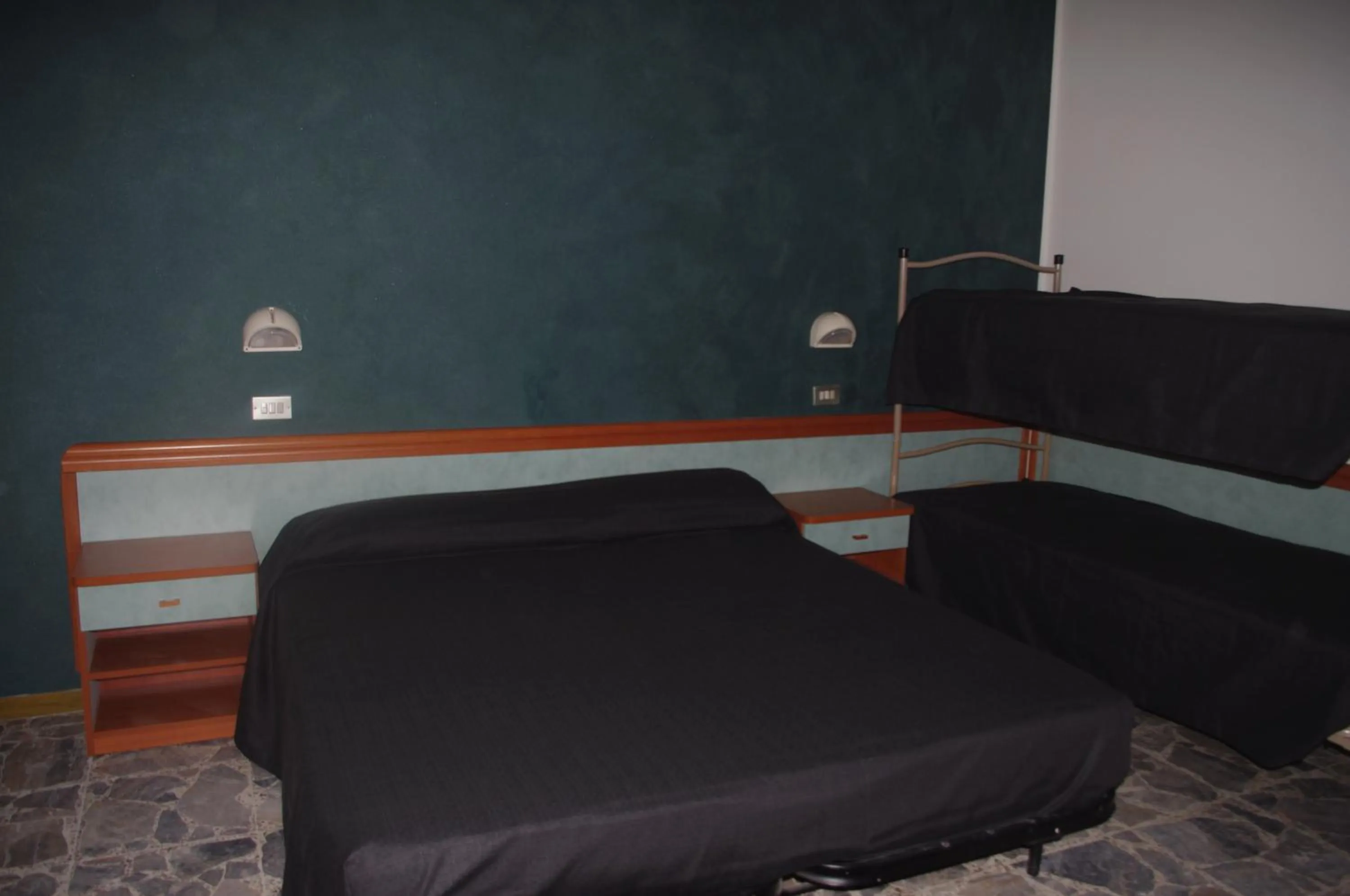 Bedroom in Hotel Costanza