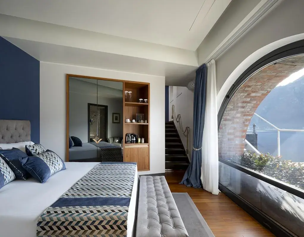 Bed in Villa Lario Resort Mandello Bed in Villa Lario Resort Mandello