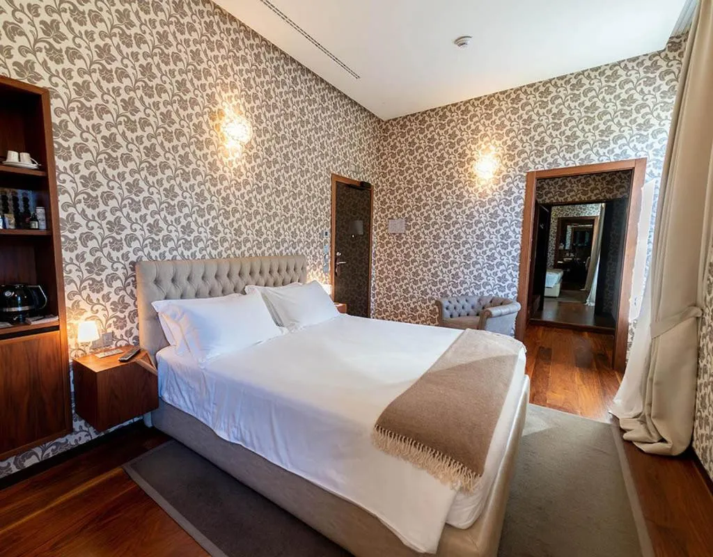 Photo of the whole room, Bed in Villa Lario Resort Mandello