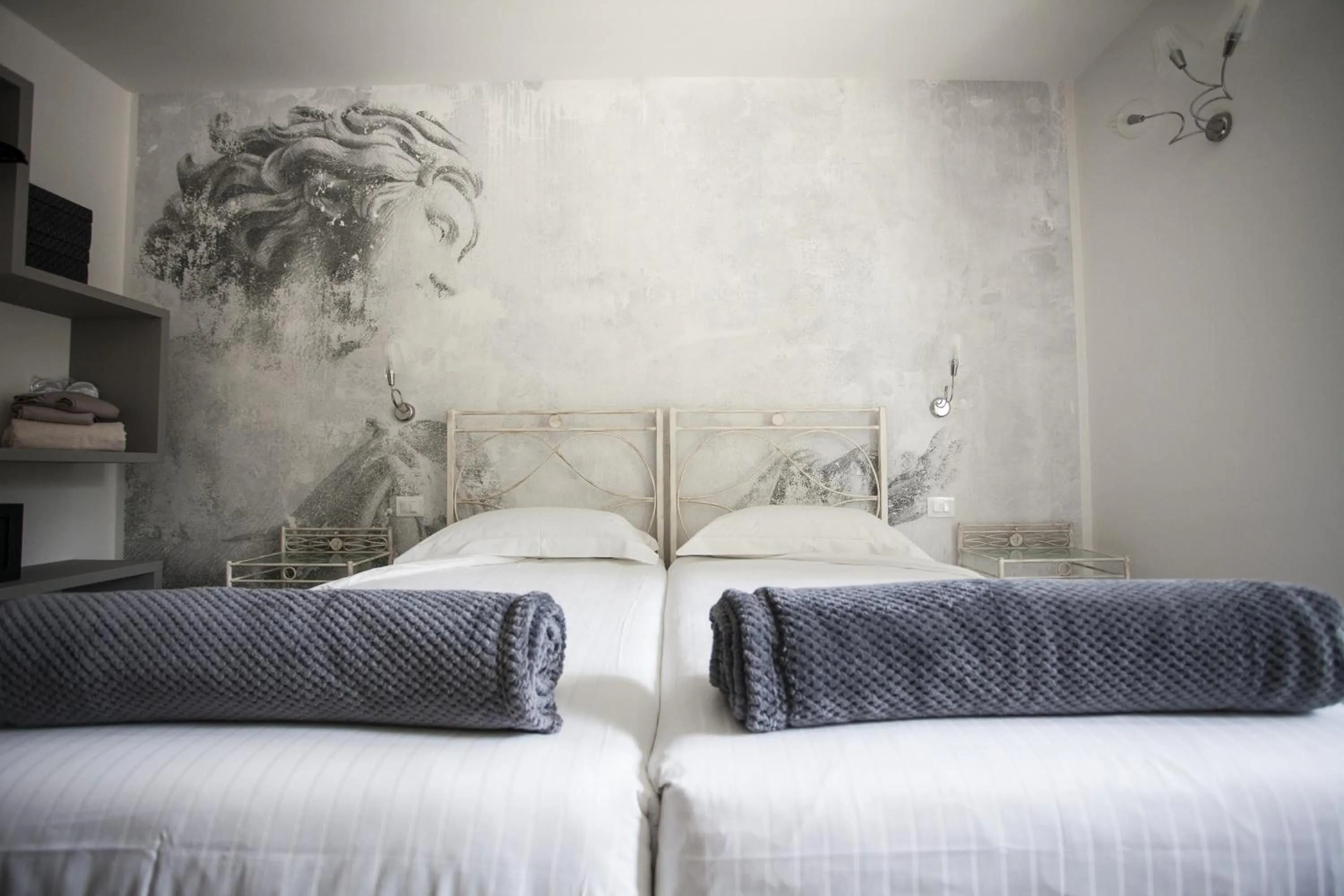 Bed in Villa Italia Luxury Suites and Apartments