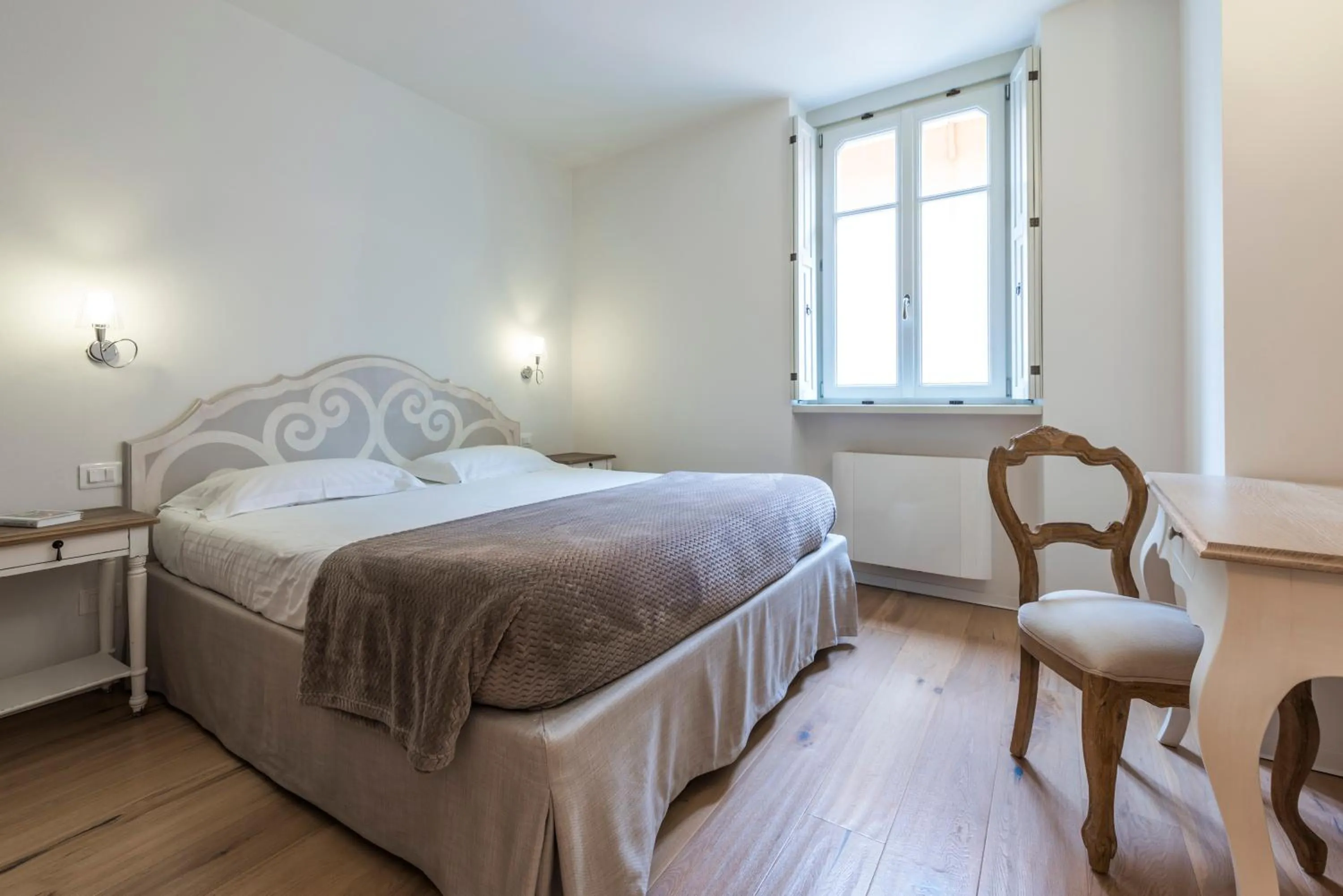 Bed in Villa Italia Luxury Suites and Apartments