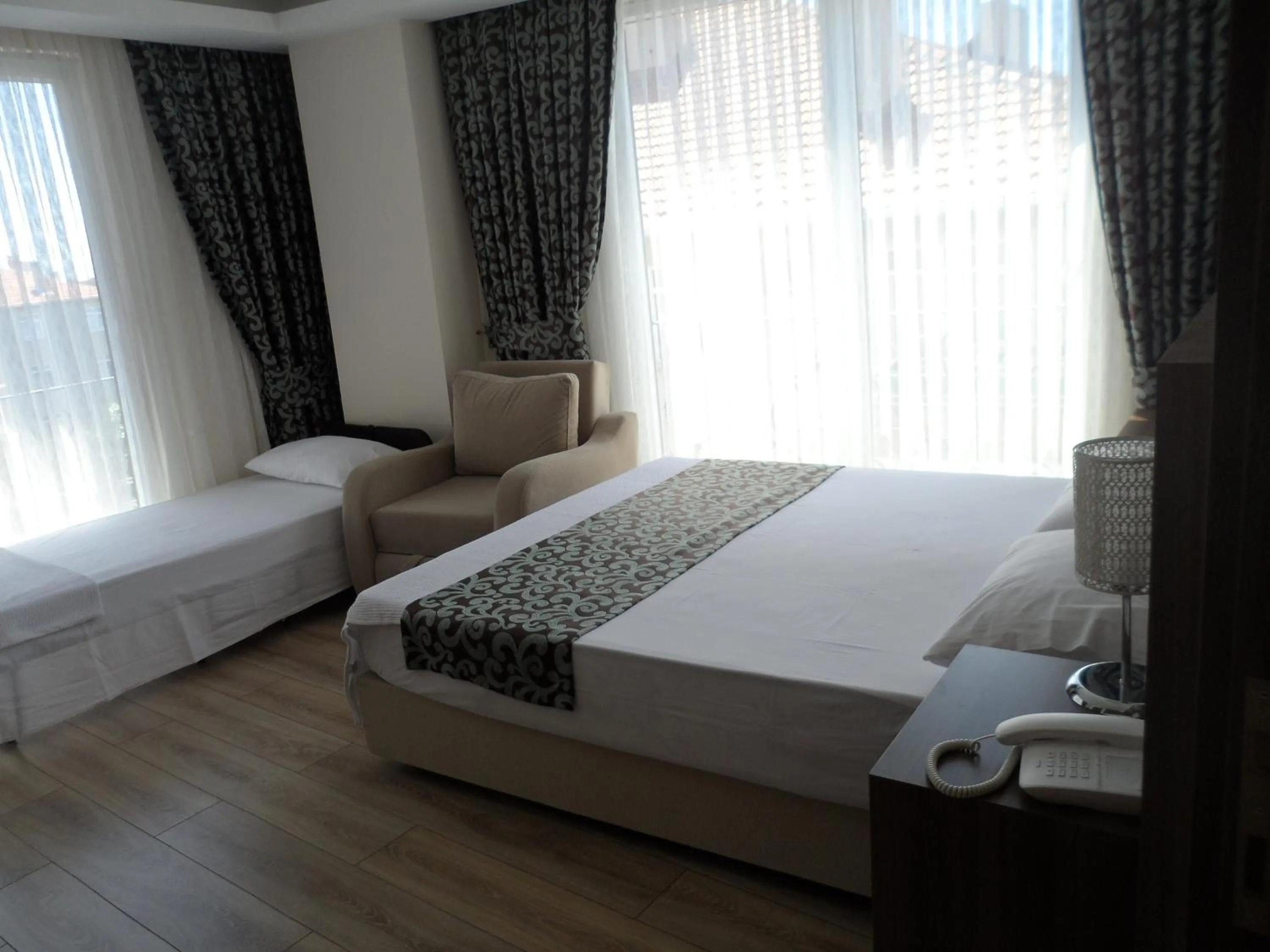 Photo of the whole room, Bed in Zen Inn Boutique