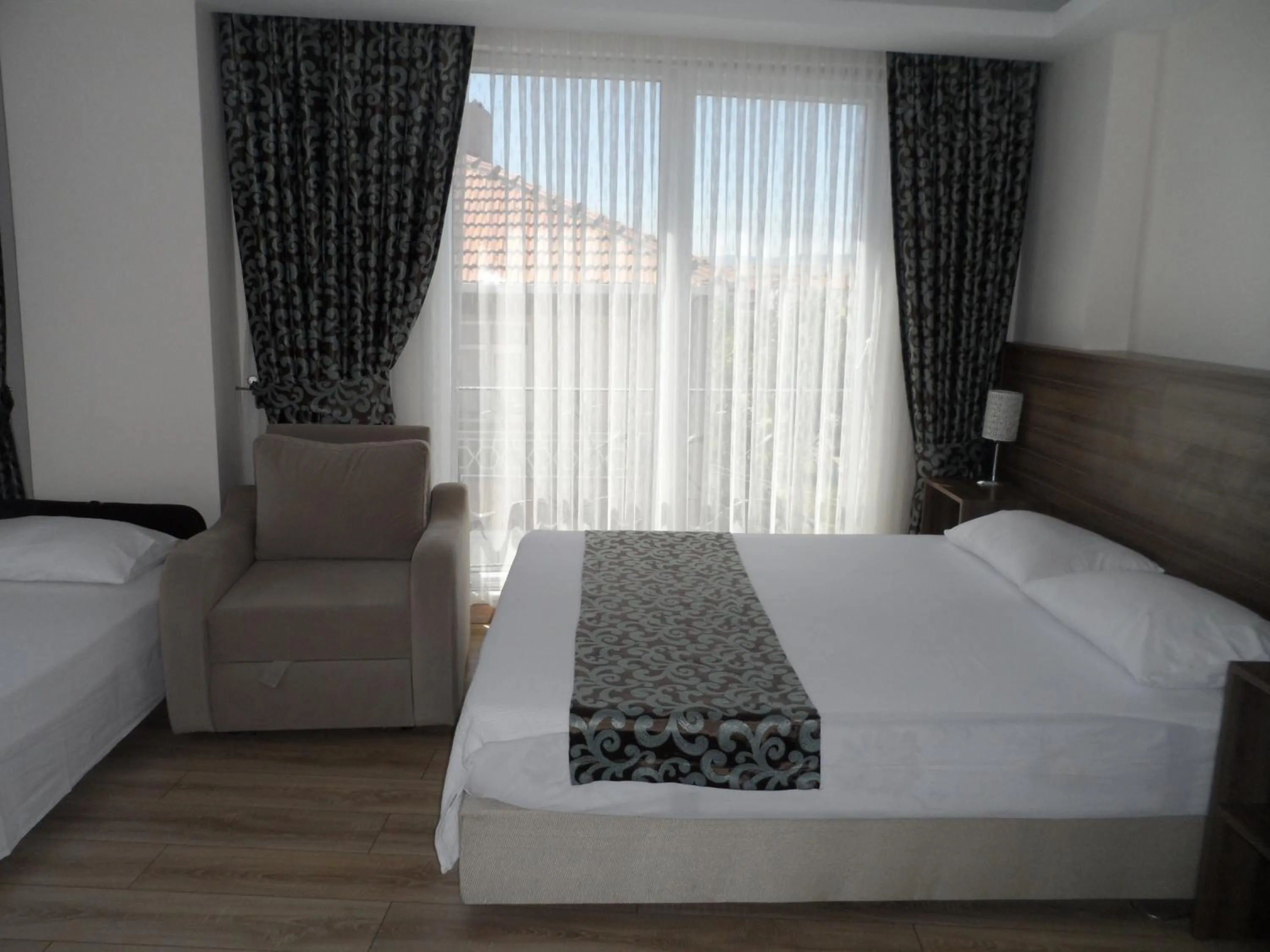 Photo of the whole room, Bed in Zen Inn Boutique