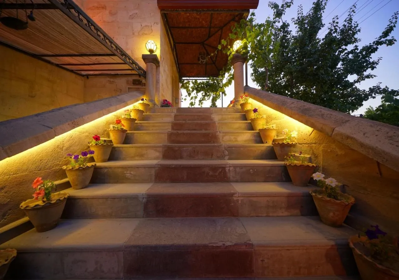 Facade/entrance in ShoeString Stone House