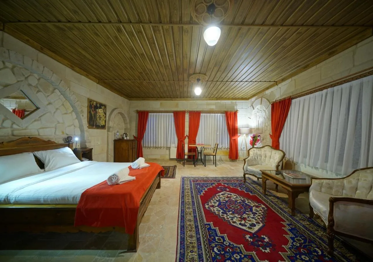 Bed in ShoeString Stone House