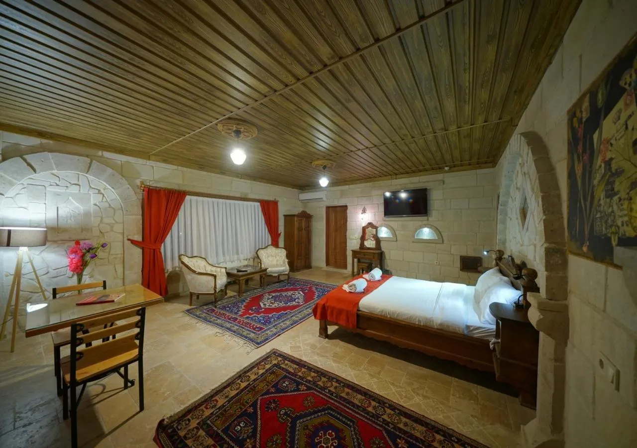 Bed in ShoeString Stone House