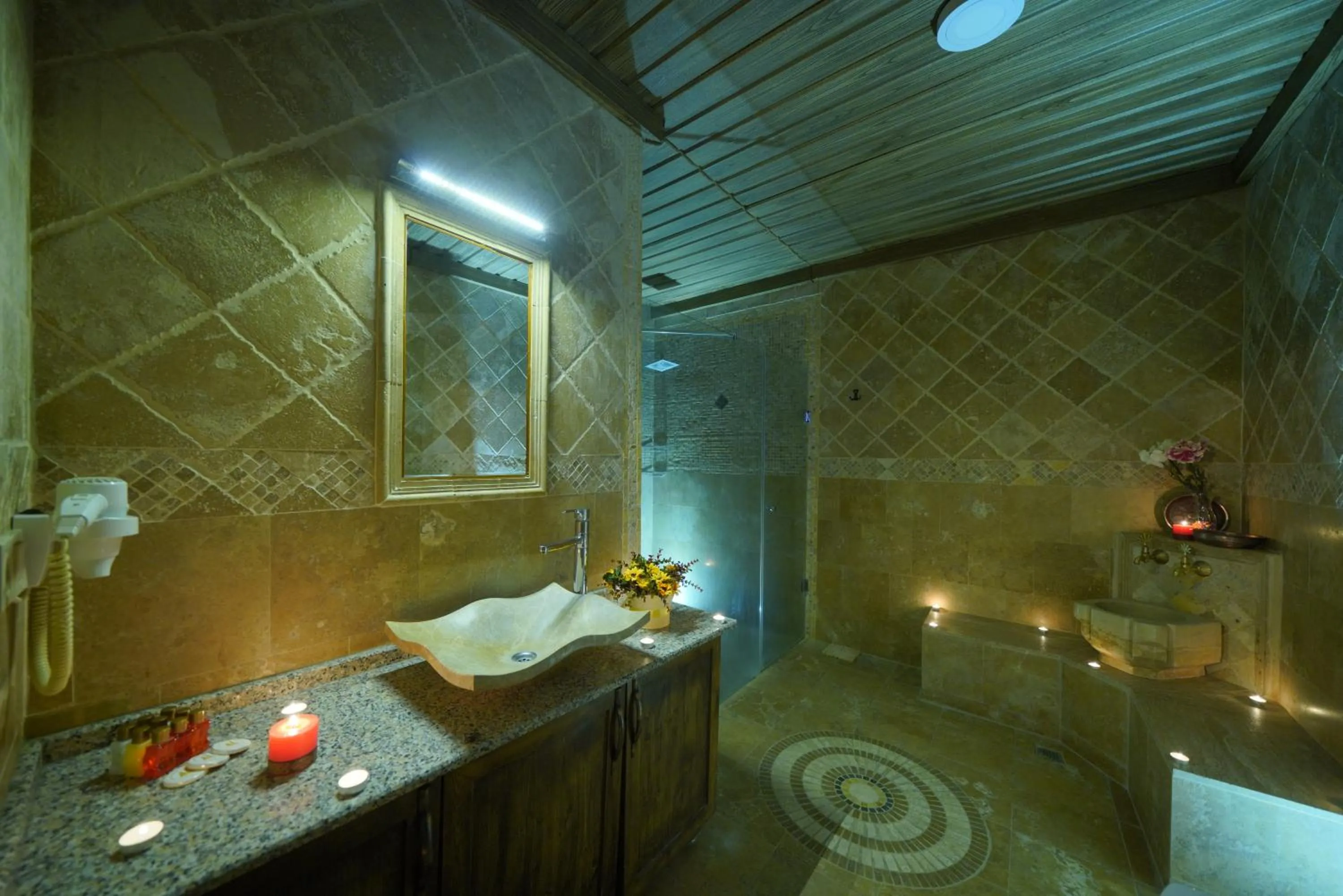 Shower in ShoeString Stone House