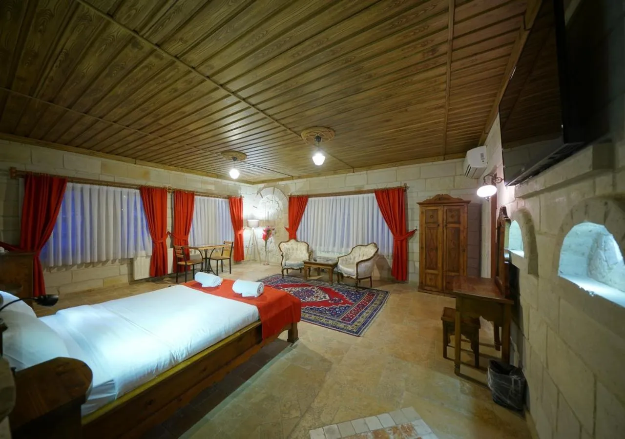 Bed in ShoeString Stone House