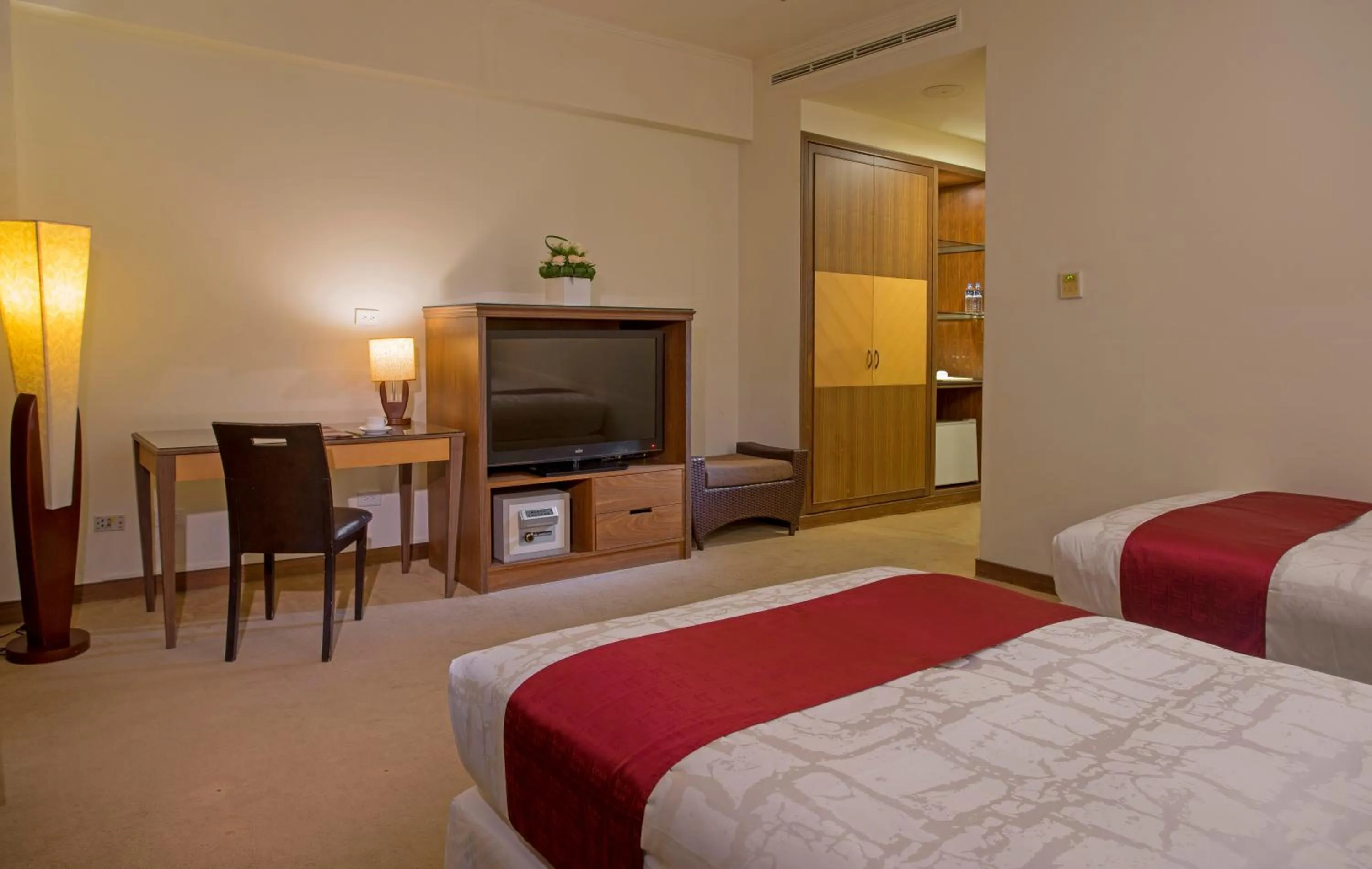 Bed in Le Beau Max Resort