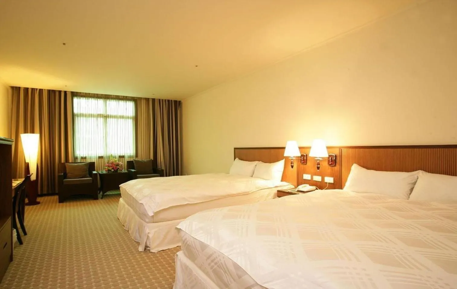 Bed in Le Beau Max Resort