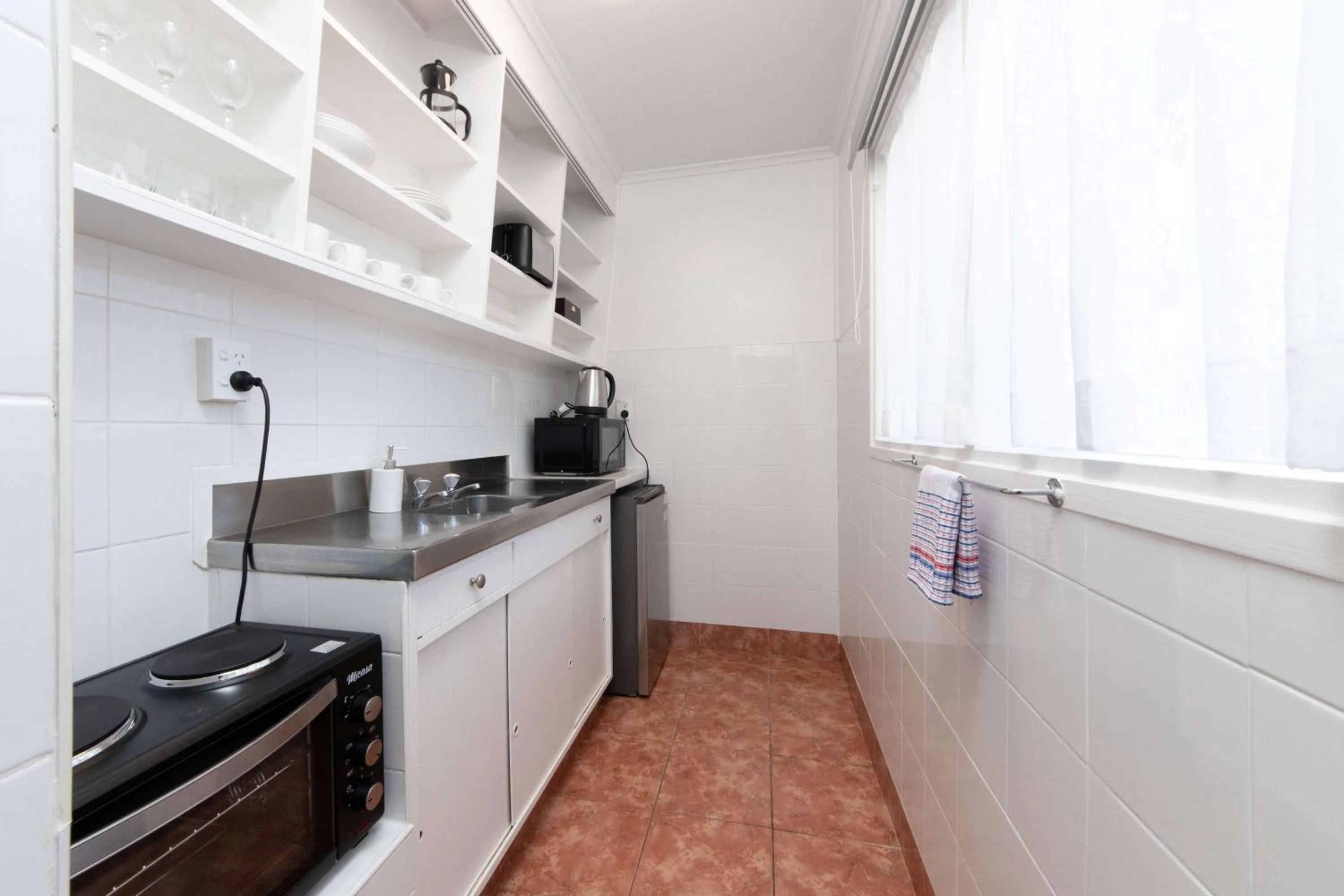 Kitchen or kitchenette in Aarangi Motel