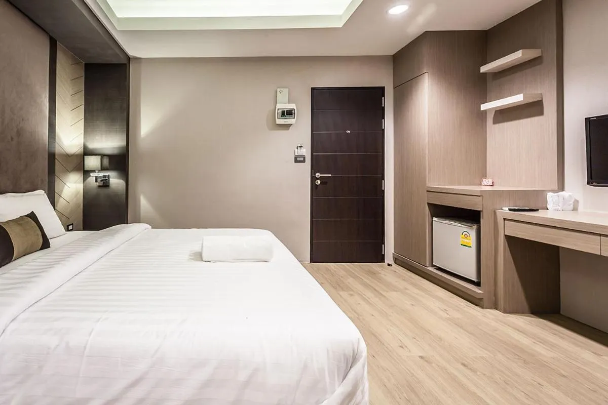 Bed in Kesorn Boutique Hotel