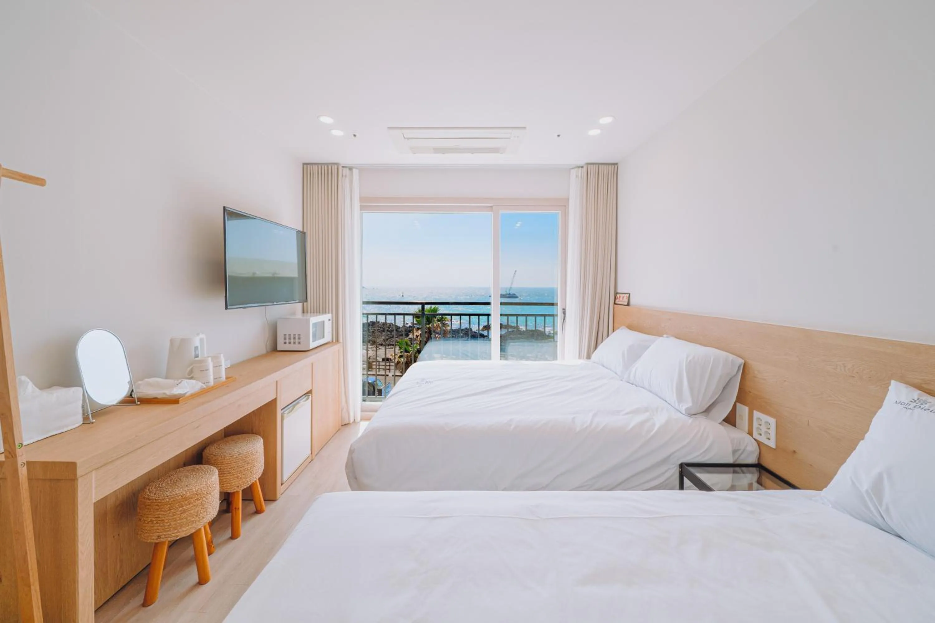 Natural landscape, Bed in Jeju Mon Dieu Hotel