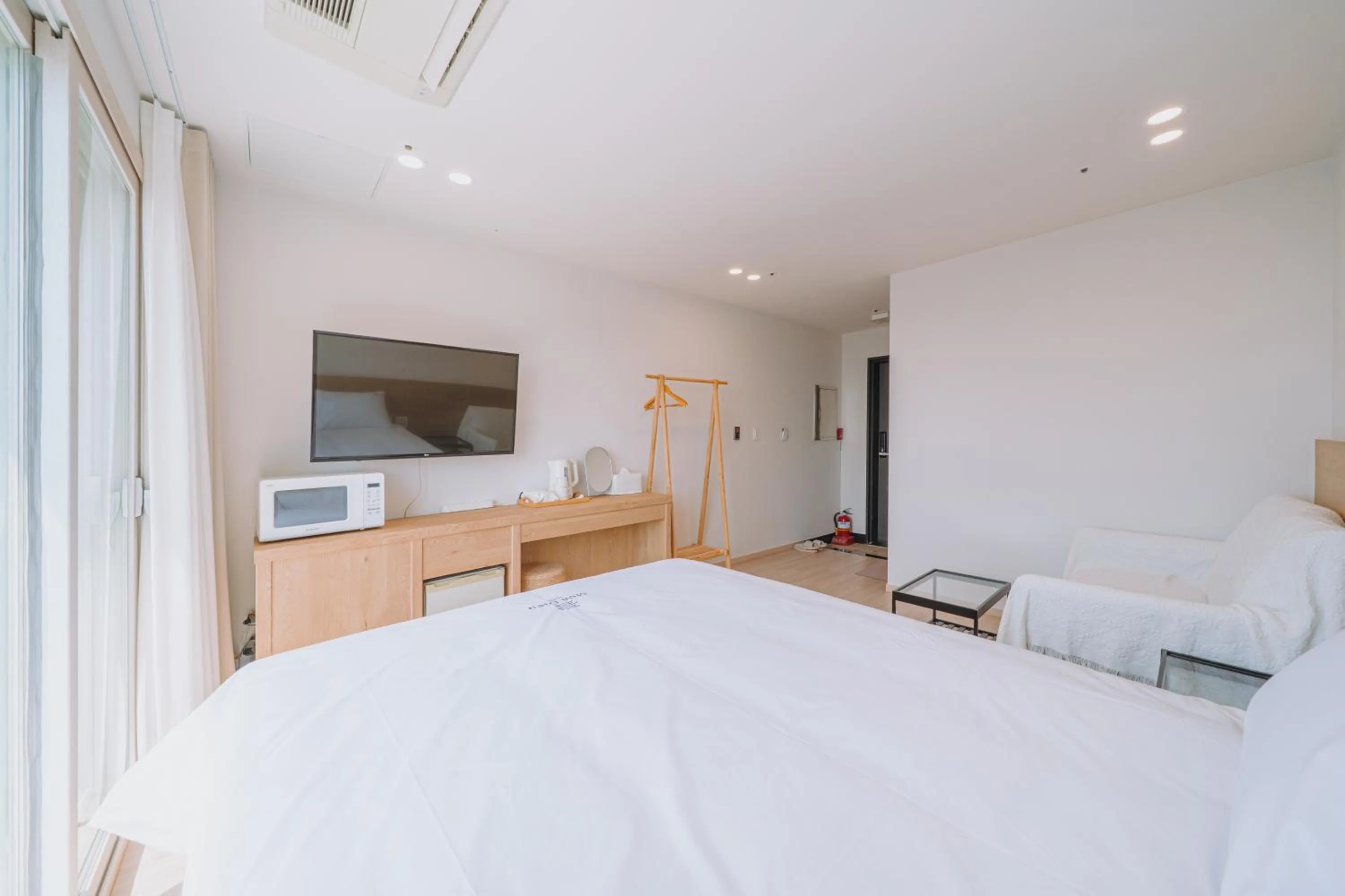 Bed in Jeju Mon Dieu Hotel