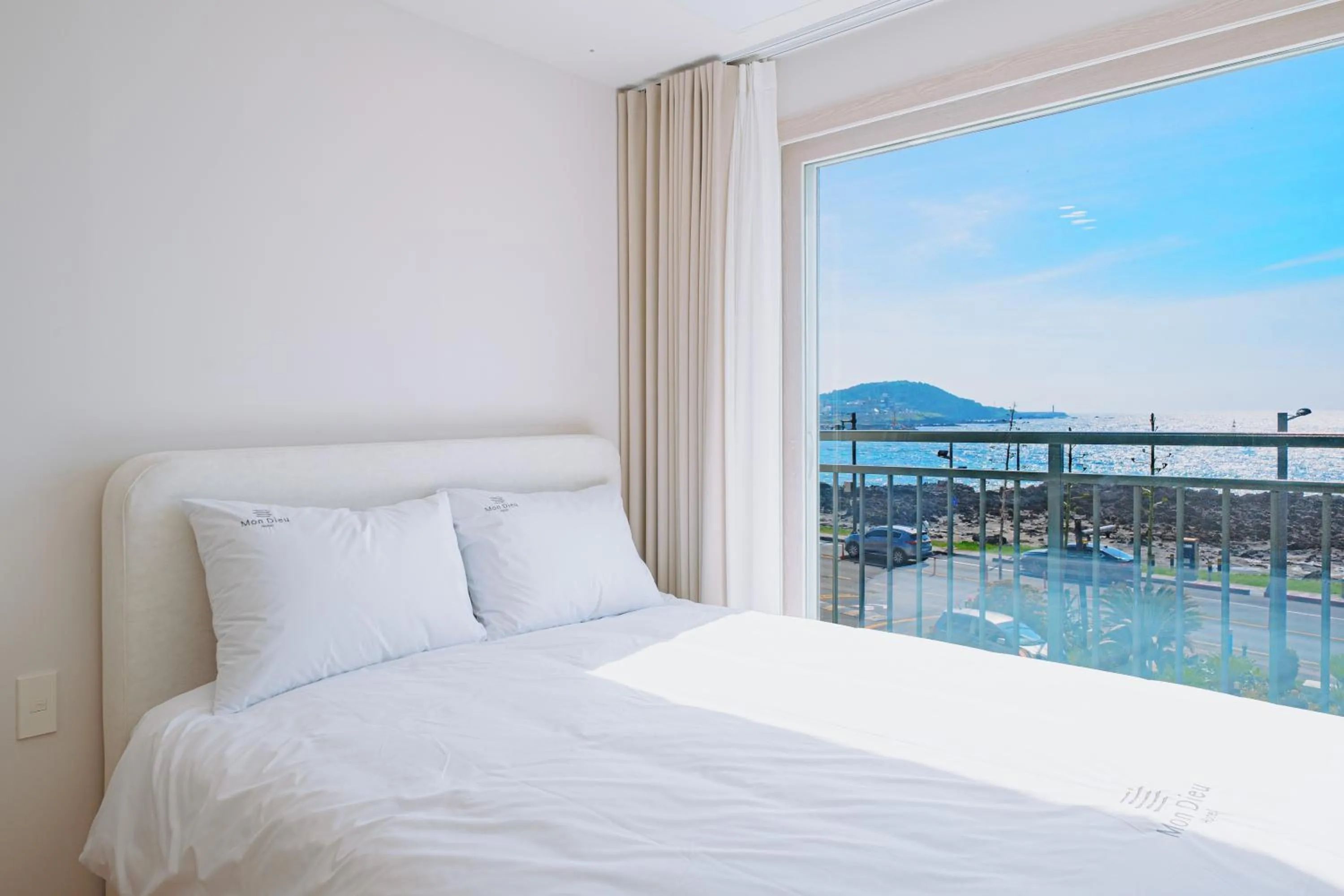 View (from property/room), Bed in Jeju Mon Dieu Hotel