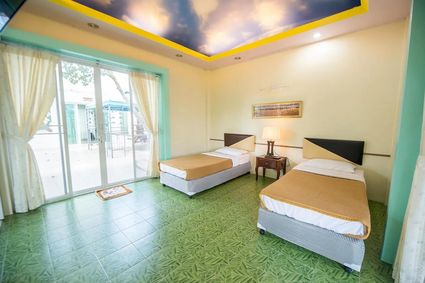 Bed in Poomvarin Resort