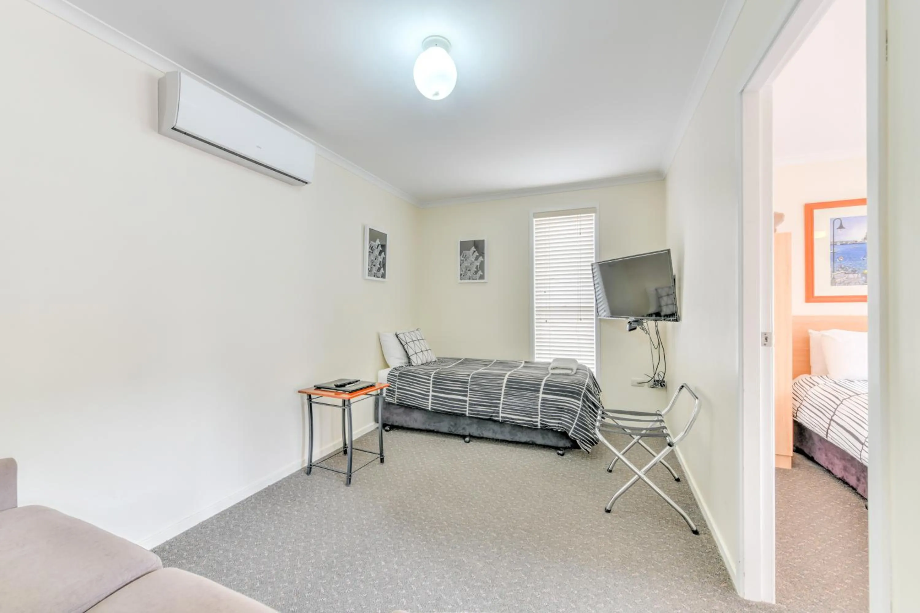 Living room, Bed in Motel Grande