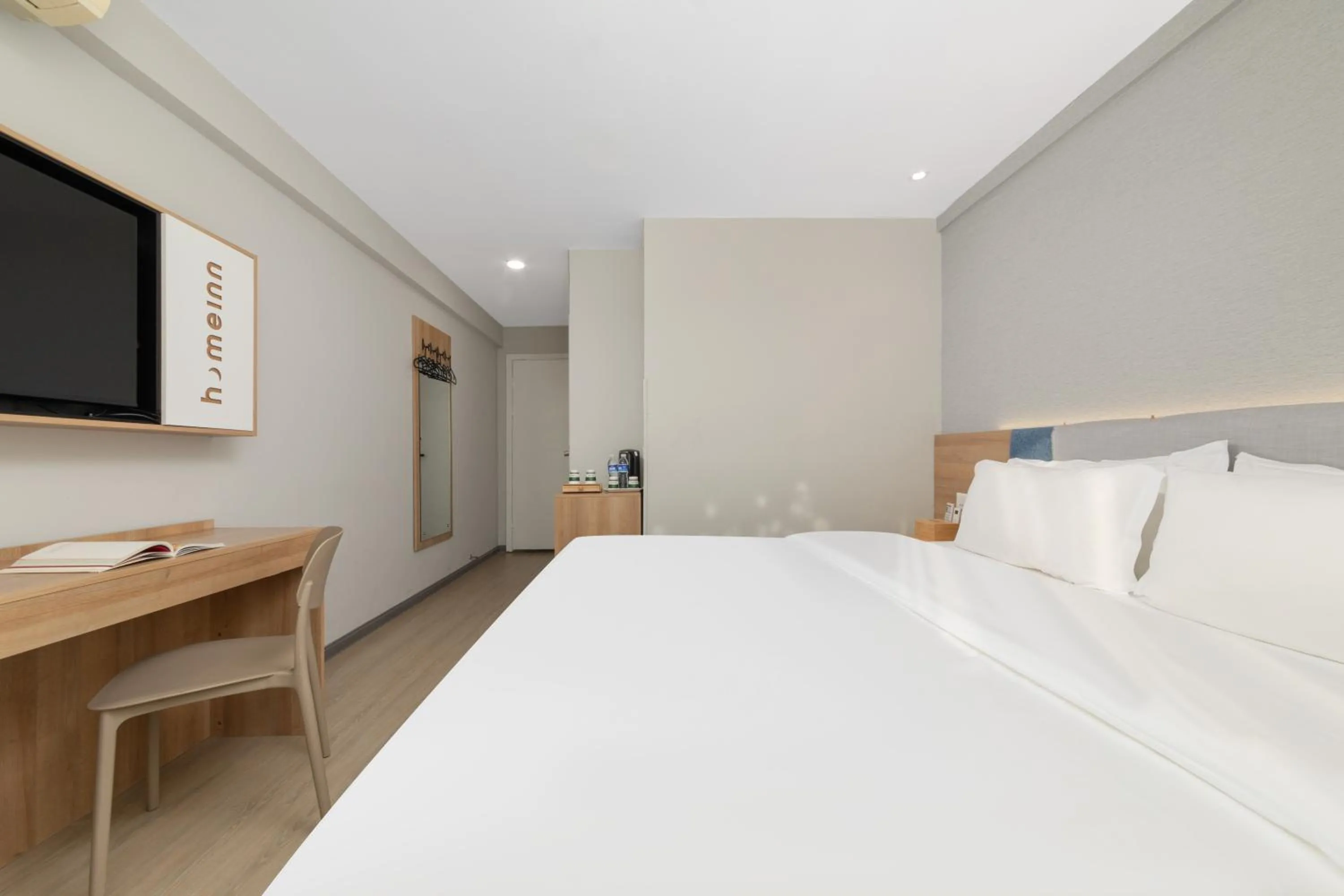 Bed in Home Inn Huayi Selected Yellow Crane Tower Tang Hualin Branch