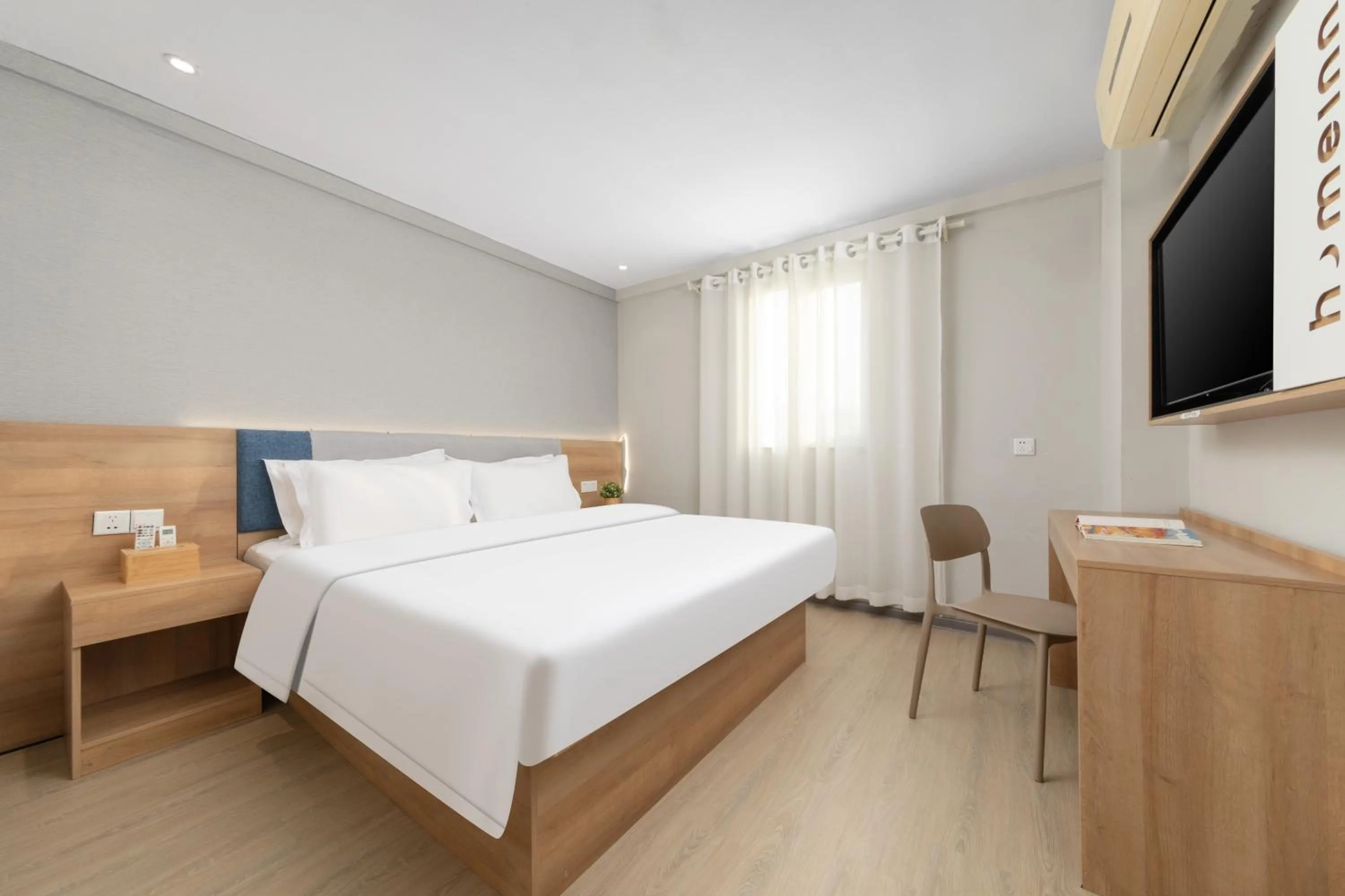 Bed in Home Inn Huayi Selected Yellow Crane Tower Tang Hualin Branch