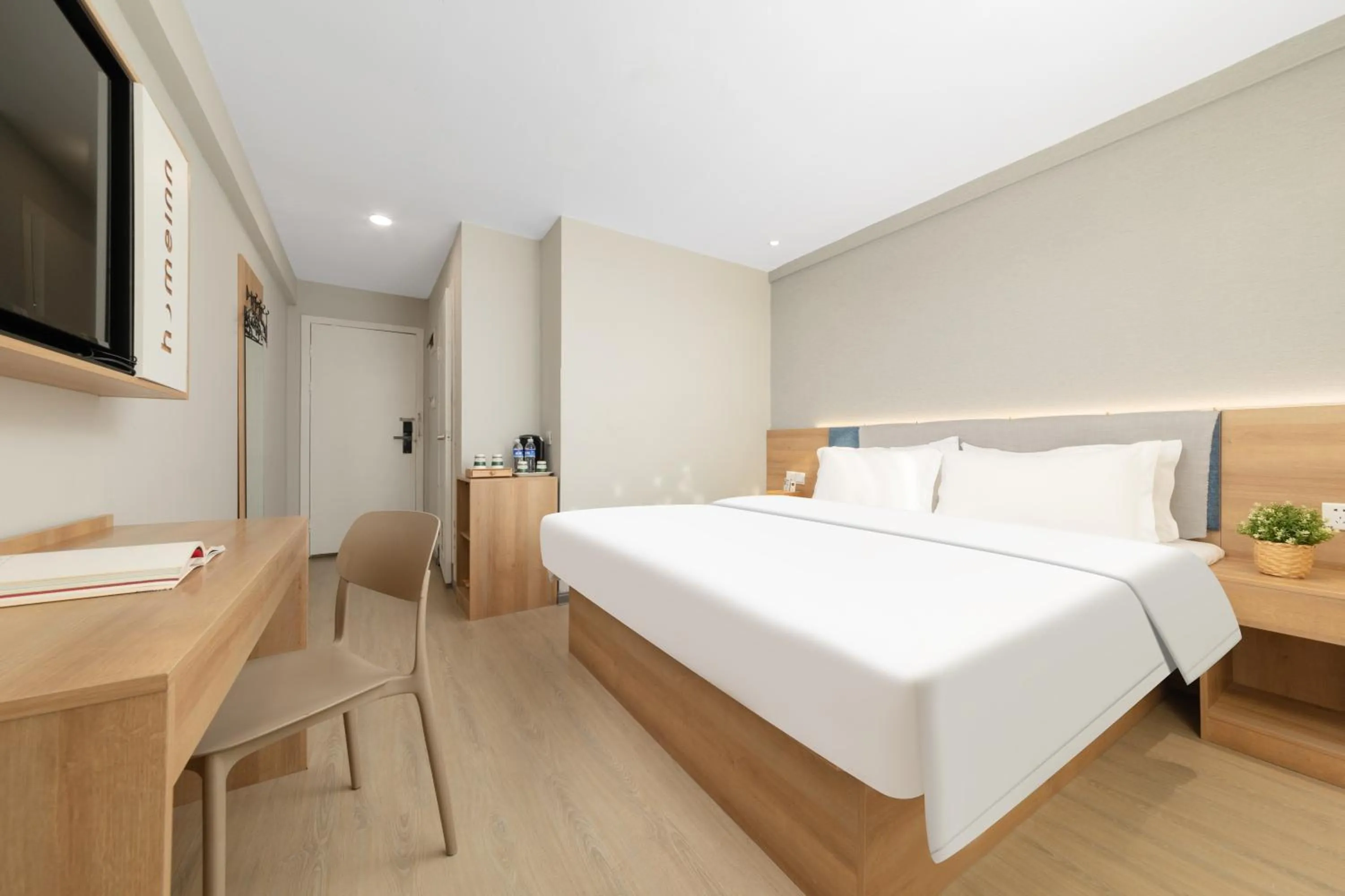 Bed in Home Inn Huayi Selected Yellow Crane Tower Tang Hualin Branch