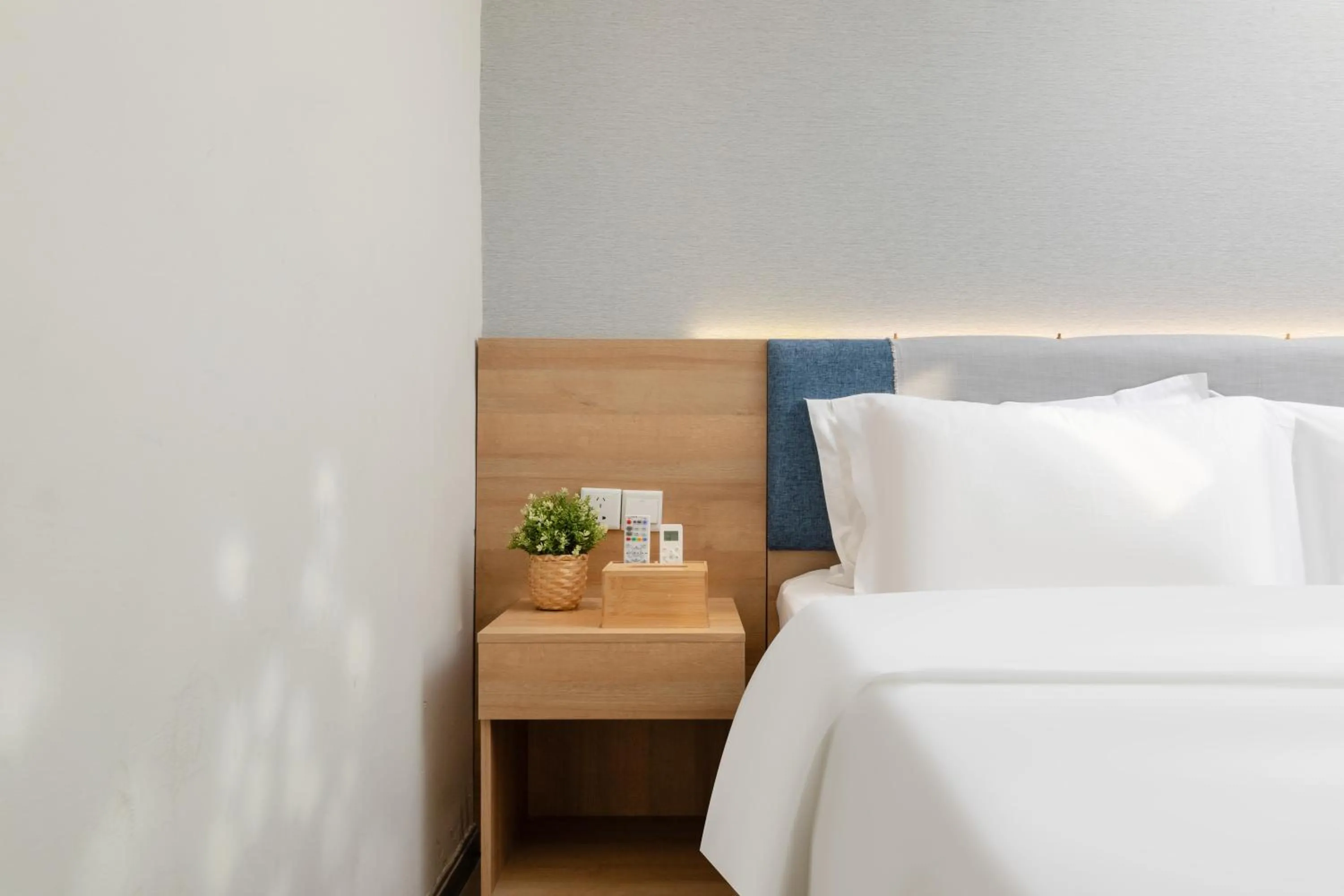 Bed in Home Inn Huayi Selected Yellow Crane Tower Tang Hualin Branch