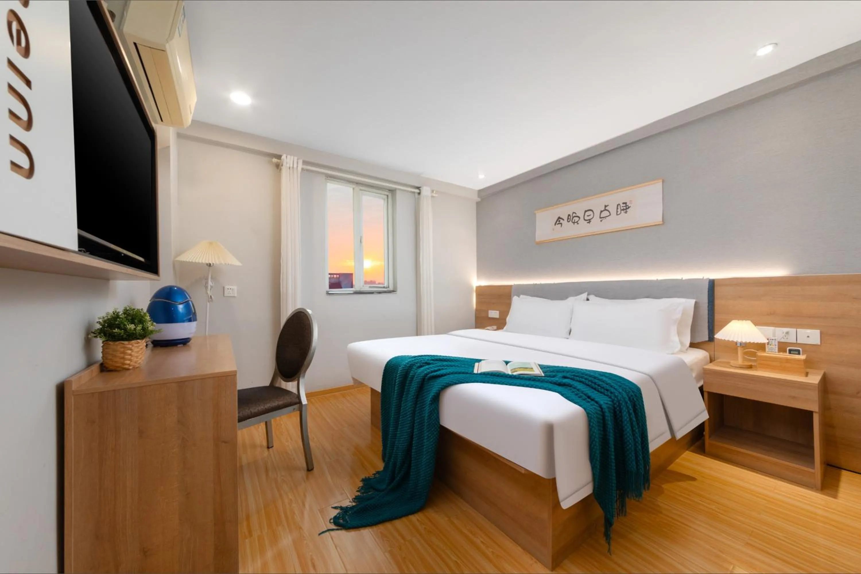 Bed in Home Inn Huayi Selected Yellow Crane Tower Tang Hualin Branch