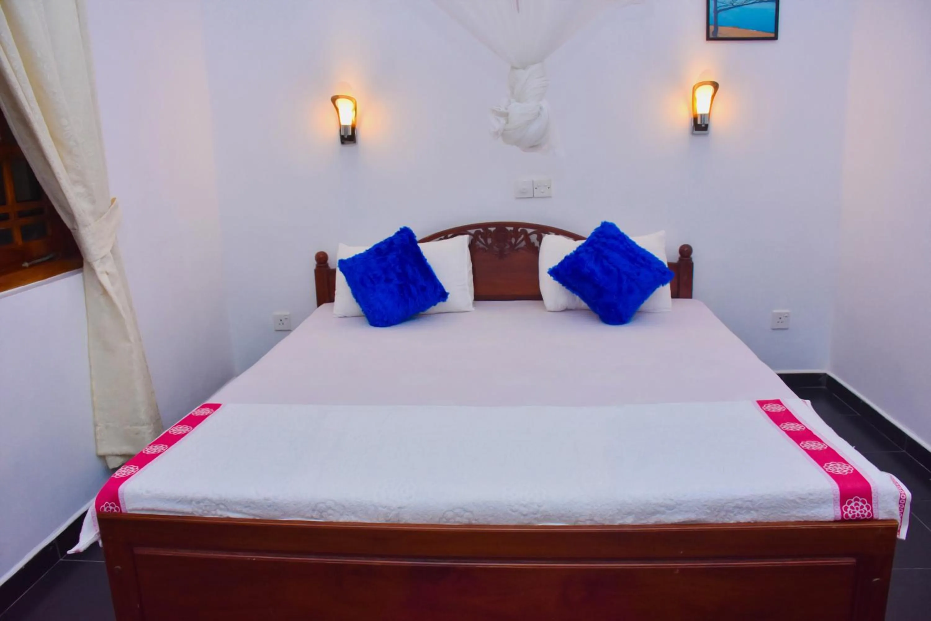 Bed in Mali Guest House