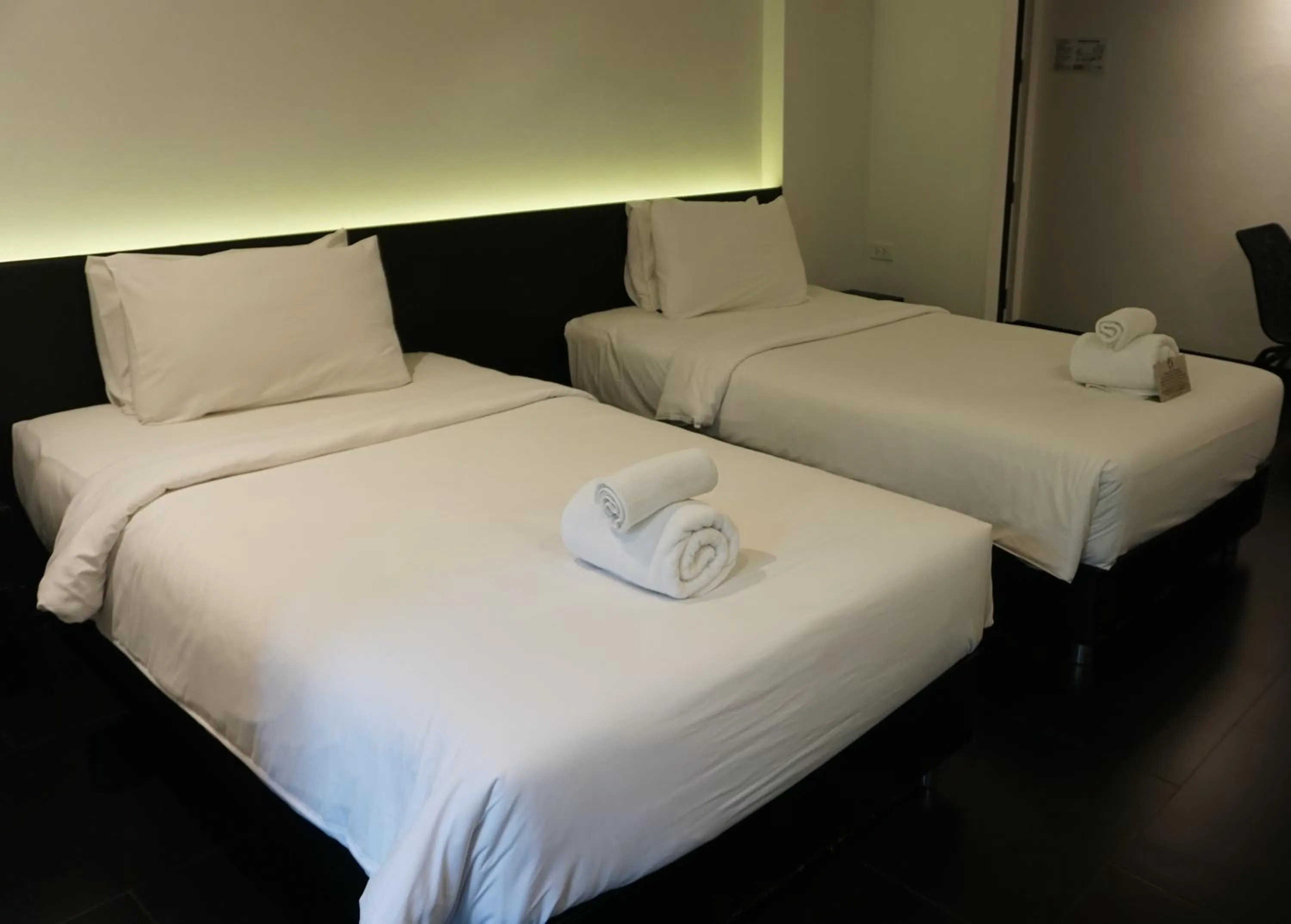 Bed in iThaphae Hotel