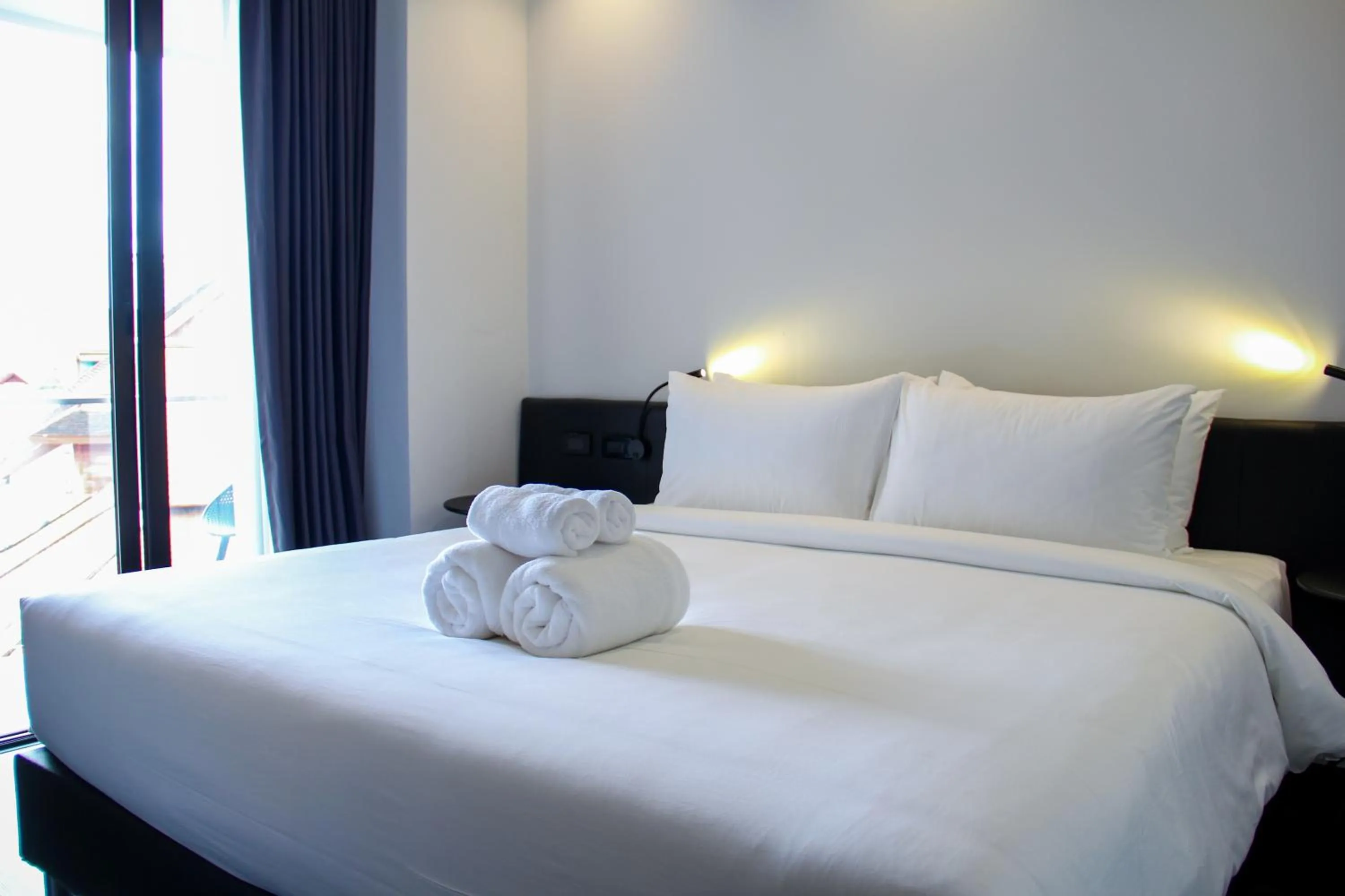 Bed in iThaphae Hotel