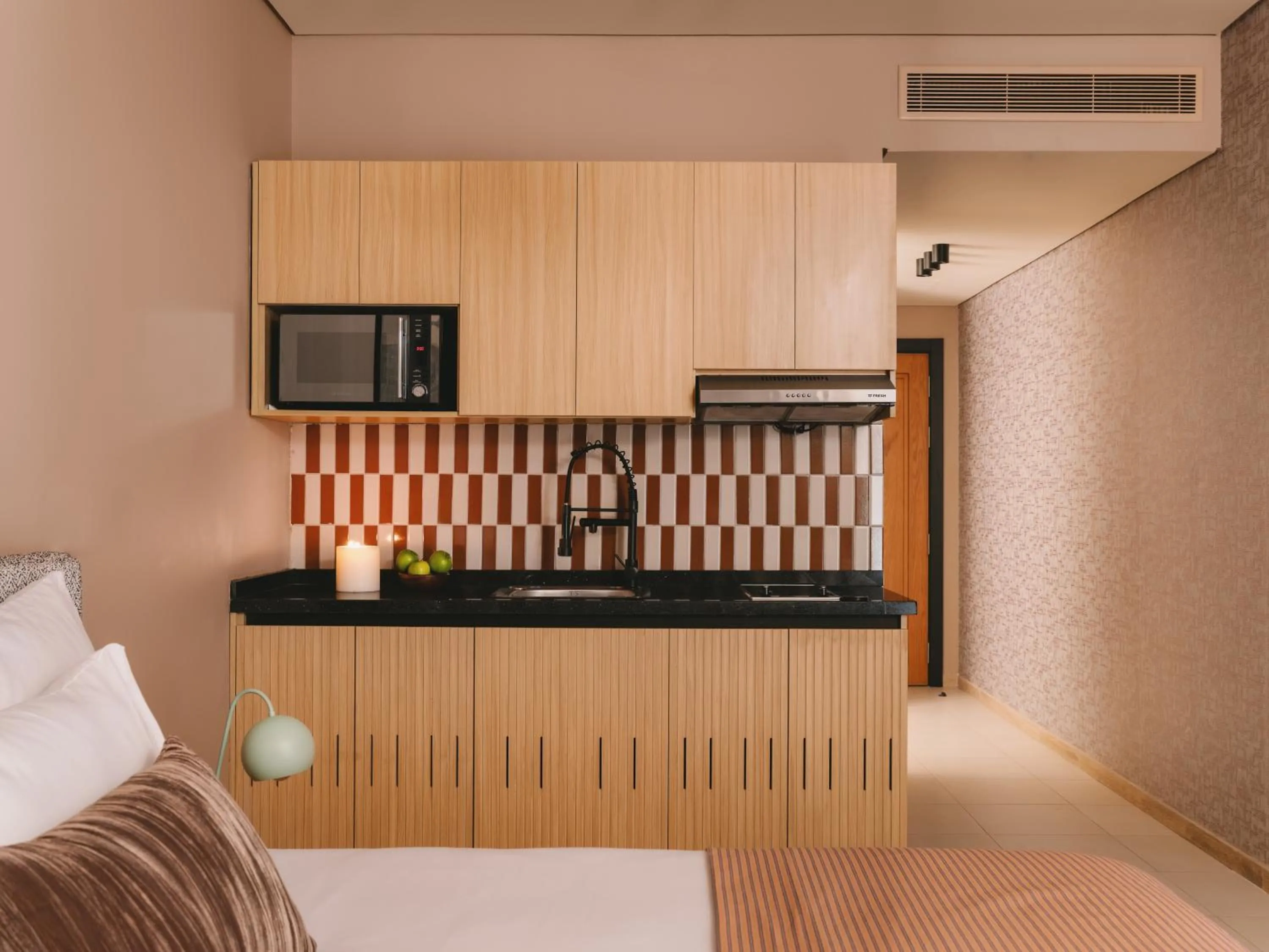 Kitchen or kitchenette, Bed in Saint J Hotel by Brassbell