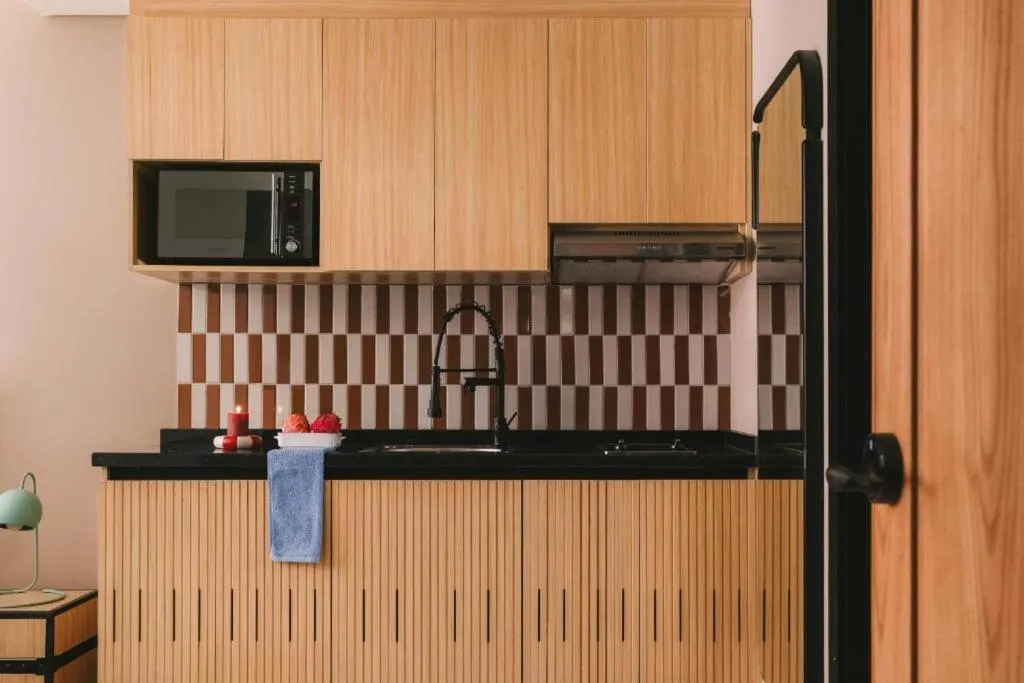 Kitchen or kitchenette in Saint J Hotel by Brassbell