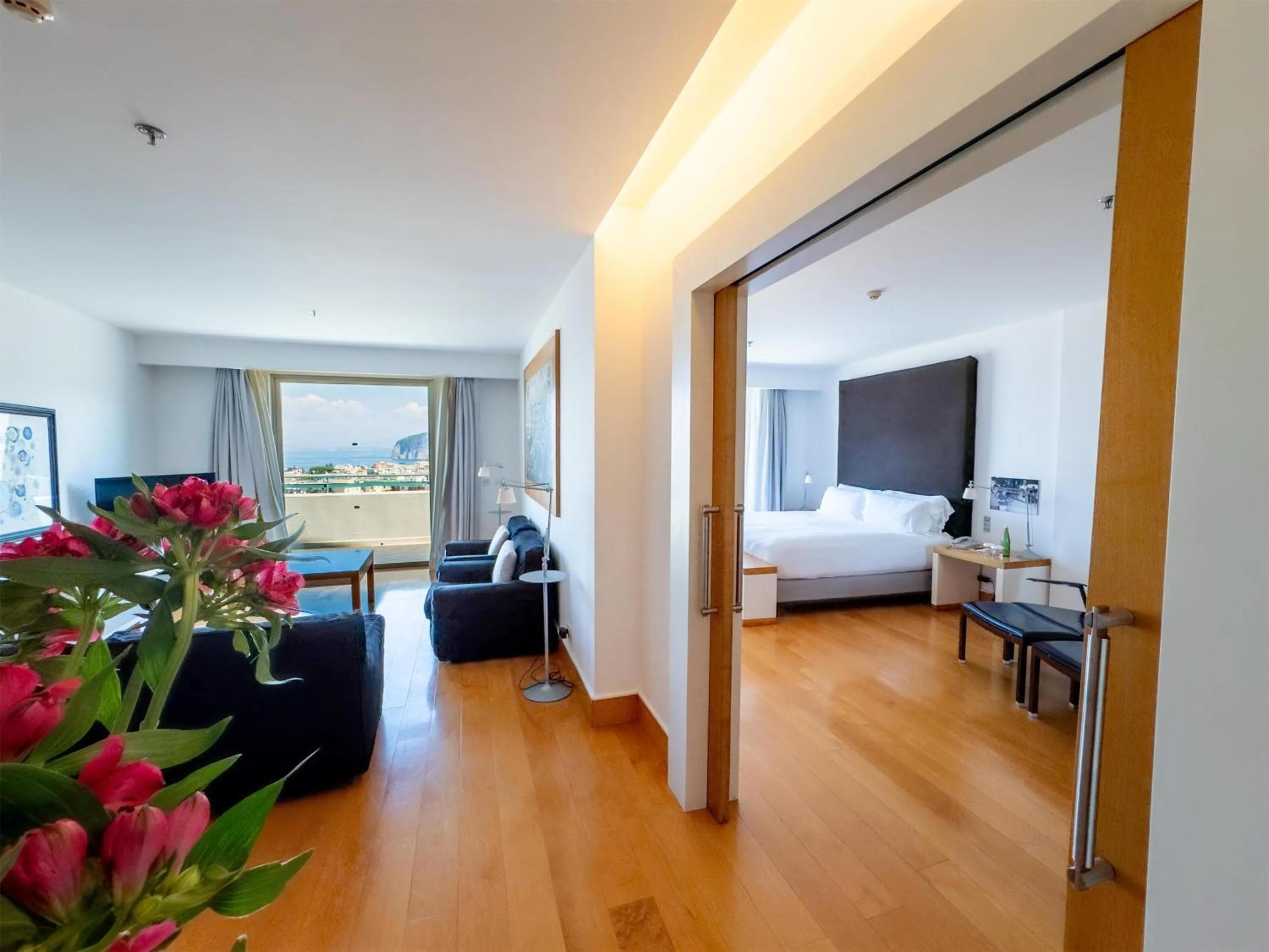 Living room, Bed in Hilton Sorrento Palace