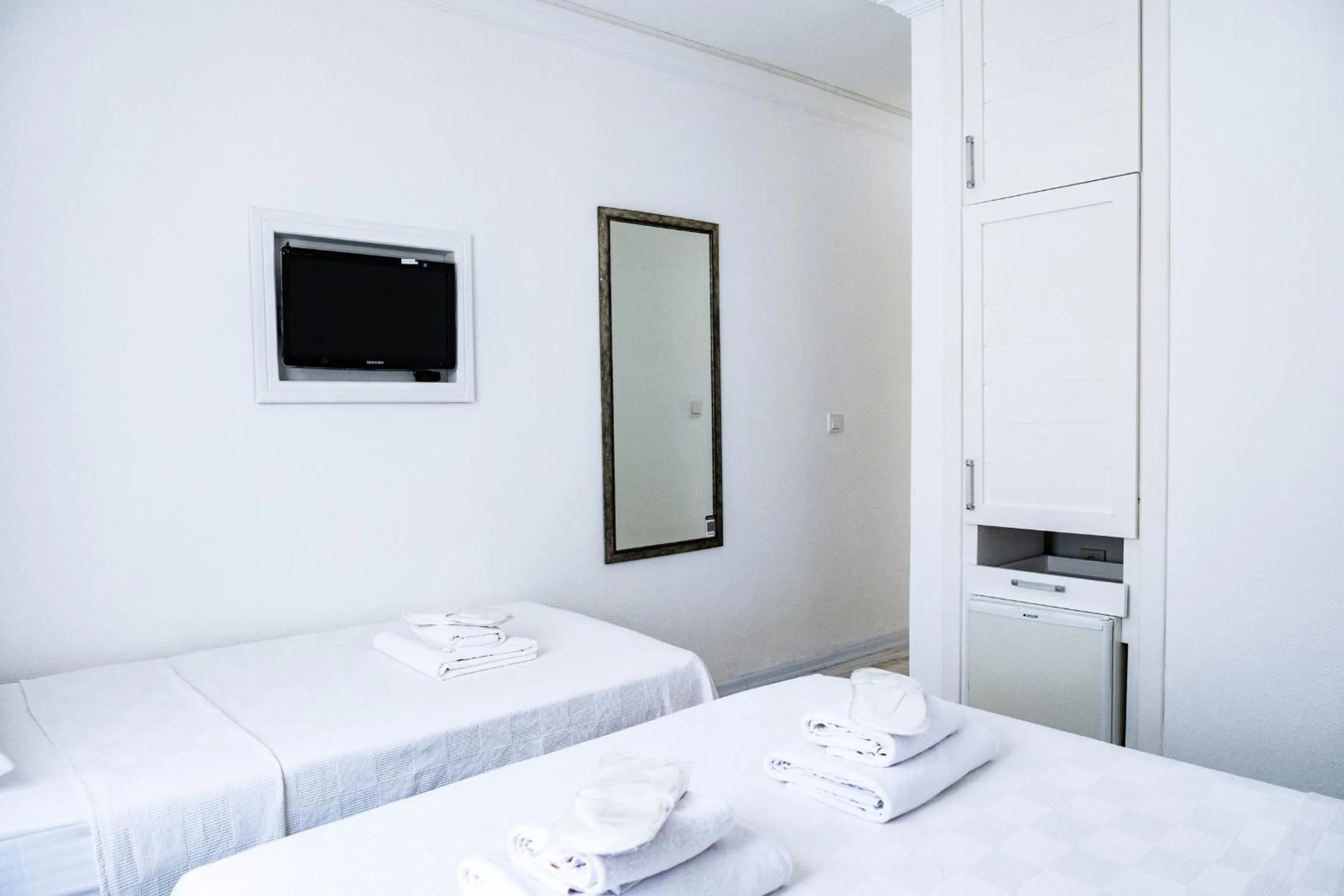 Bedroom, Bed in Mauna Hotel