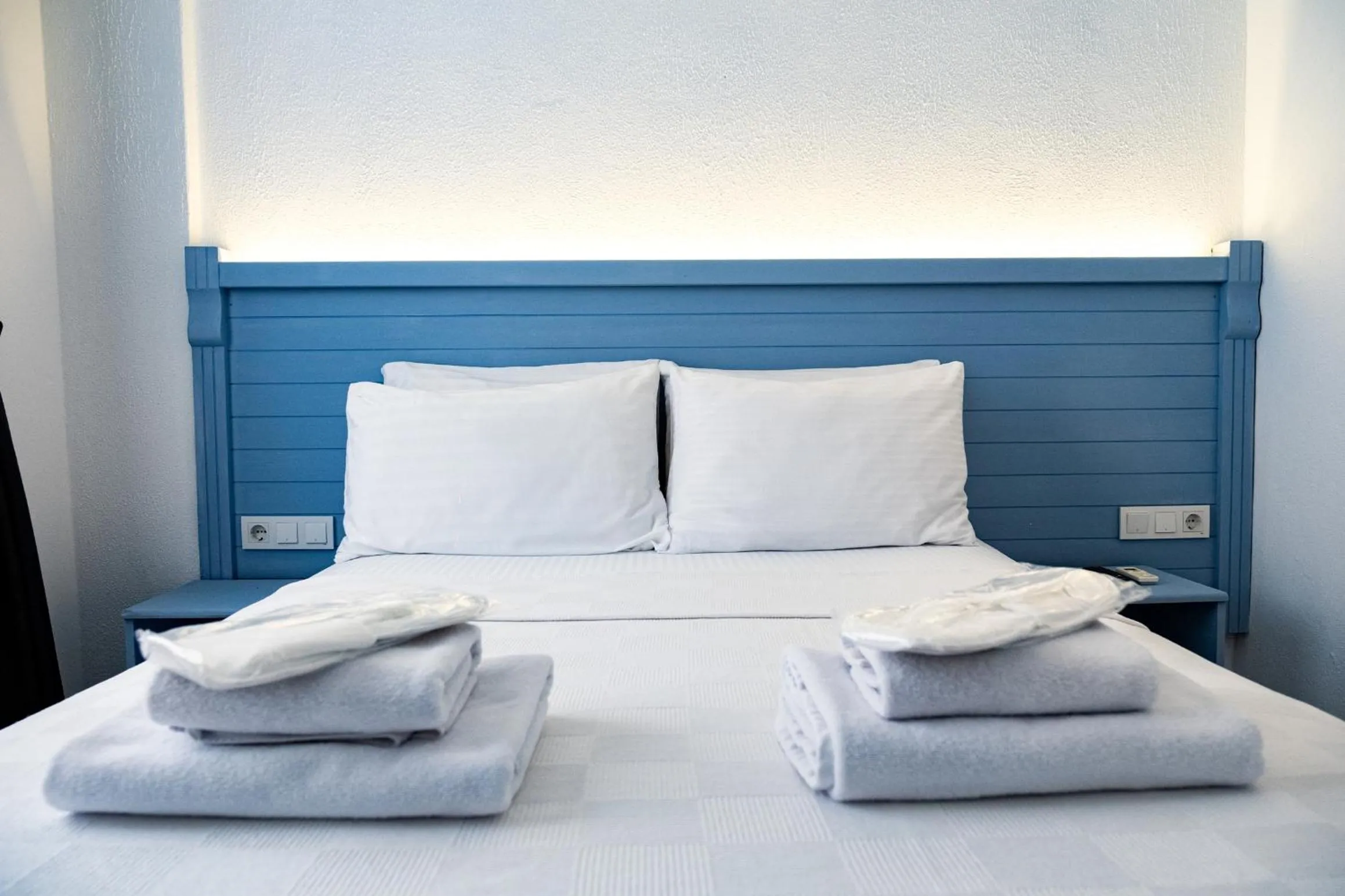 Bedroom, Bed in Mauna Hotel