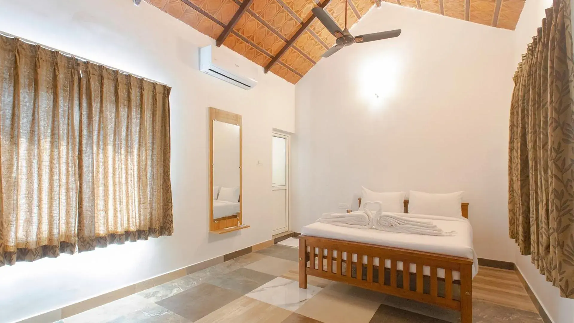 Bed in AARA Jungle Resort Bed in AARA Jungle Resort