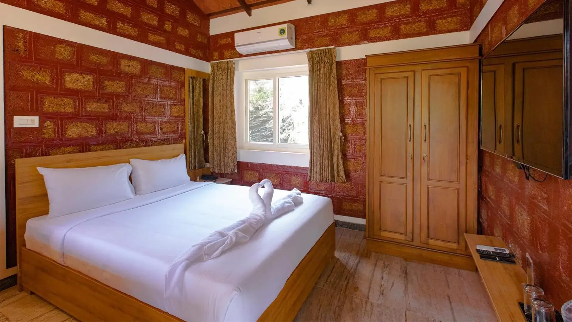 Bed in AARA Jungle Resort Bed in AARA Jungle Resort